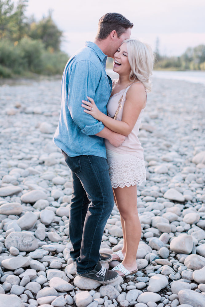 sunset engagement photography, pastel, river, laughing, calgary