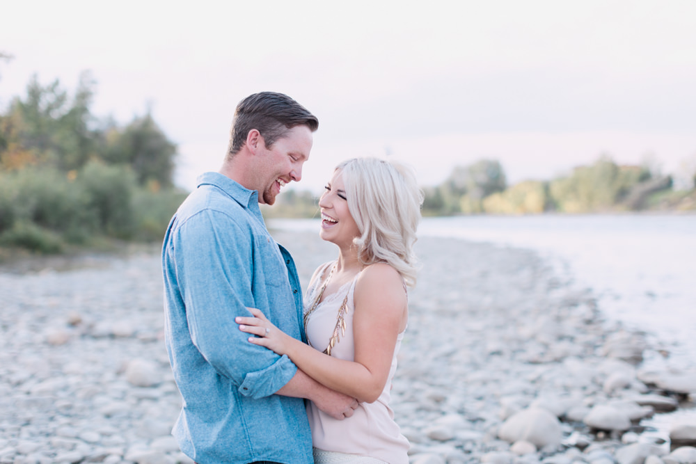 sunset engagement photography, pastel, river, laughing, calgary
