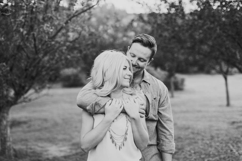 sunset engagement photography, pastel, river, laughing, calgary, romantic black and white
