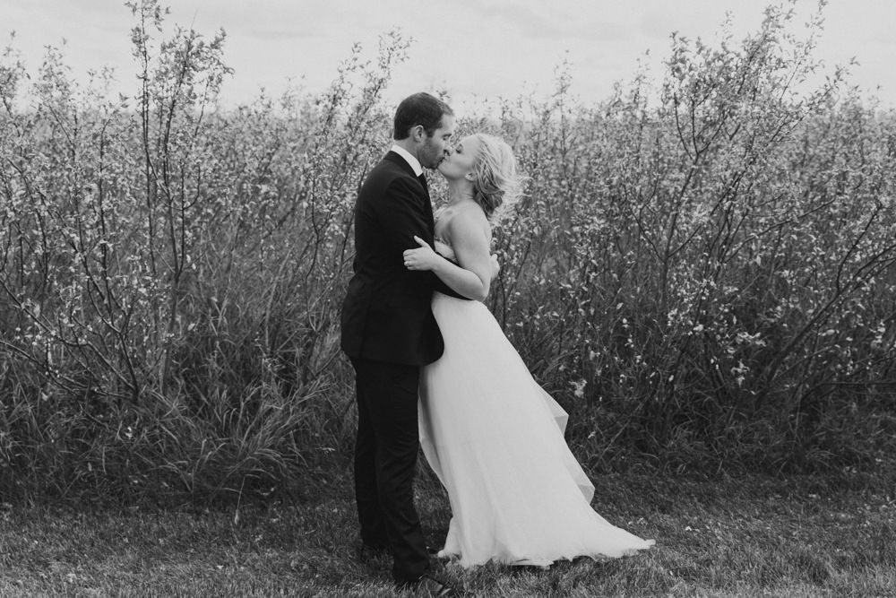 black and white photo, portrait, wedding photography, couple kissing nicole sarah photography calgary