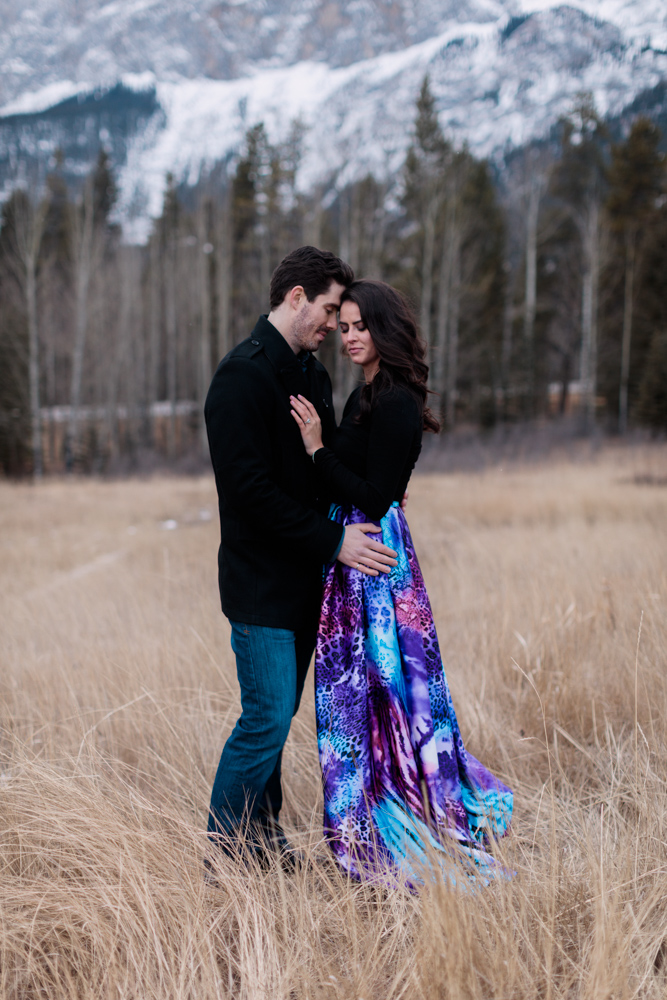 Romantic Canmore Engagement, mountain engagement photography, christmas engagement, christmas wedding photos, couple poses, romantic proposal