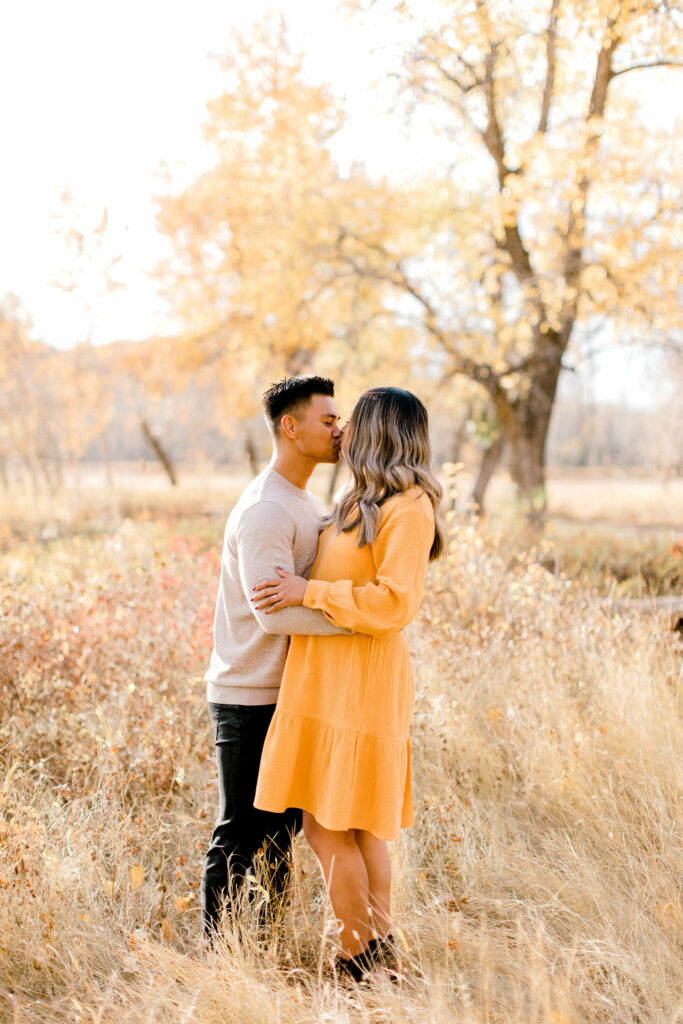 fall photos, maternity session, poses, fall outfits, yellow dress, orange dress, pregnant, pregnancy announcement, baby announcement, fall leaves