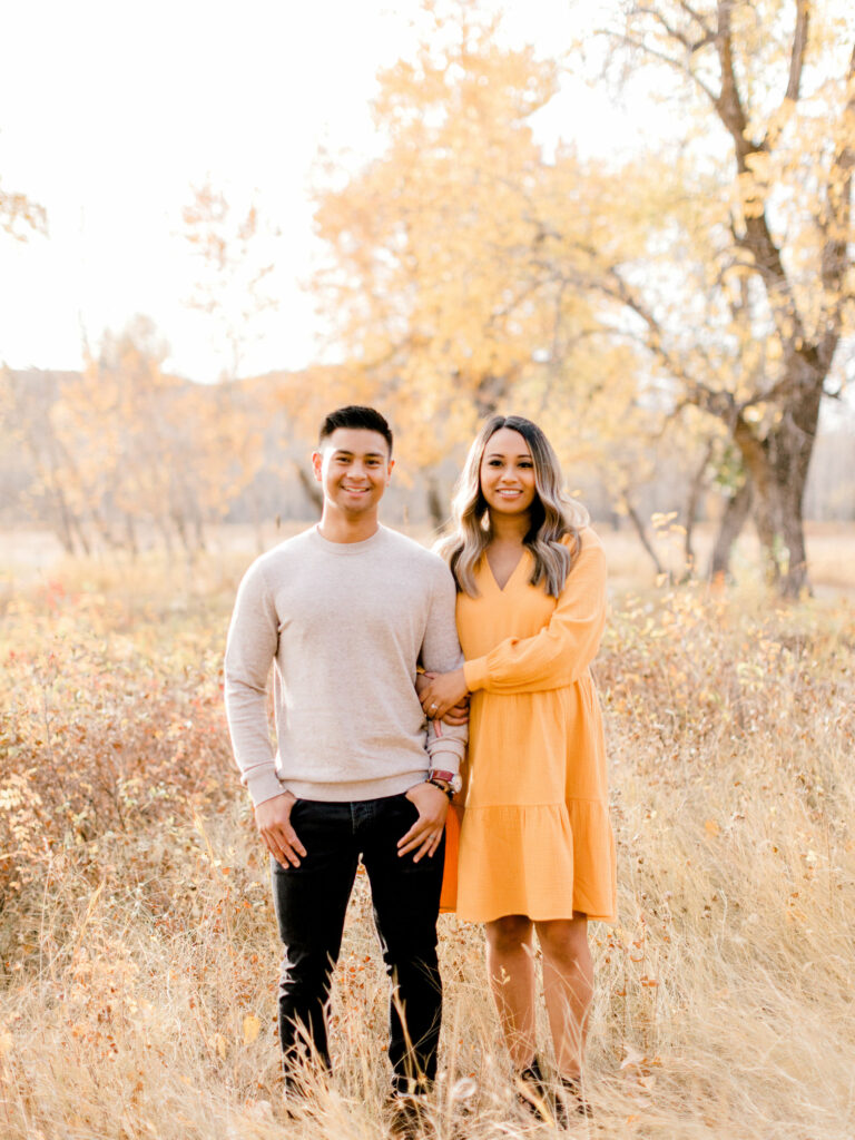 fall photos, maternity session, poses, fall outfits, yellow dress, orange dress, pregnant, pregnancy announcement, baby announcement, fall leaves