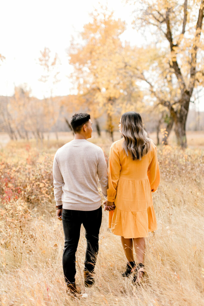 fall photos, maternity session, poses, fall outfits, yellow dress, orange dress, pregnant, pregnancy announcement, baby announcement, fall leaves, cute poses, romantic poses