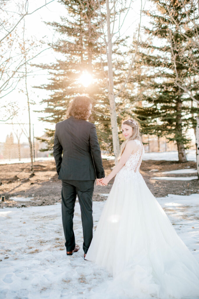 bride groom walking, winter snow wedding, elopement in calgary, Calgary Winter Elopement Nicole Sarah