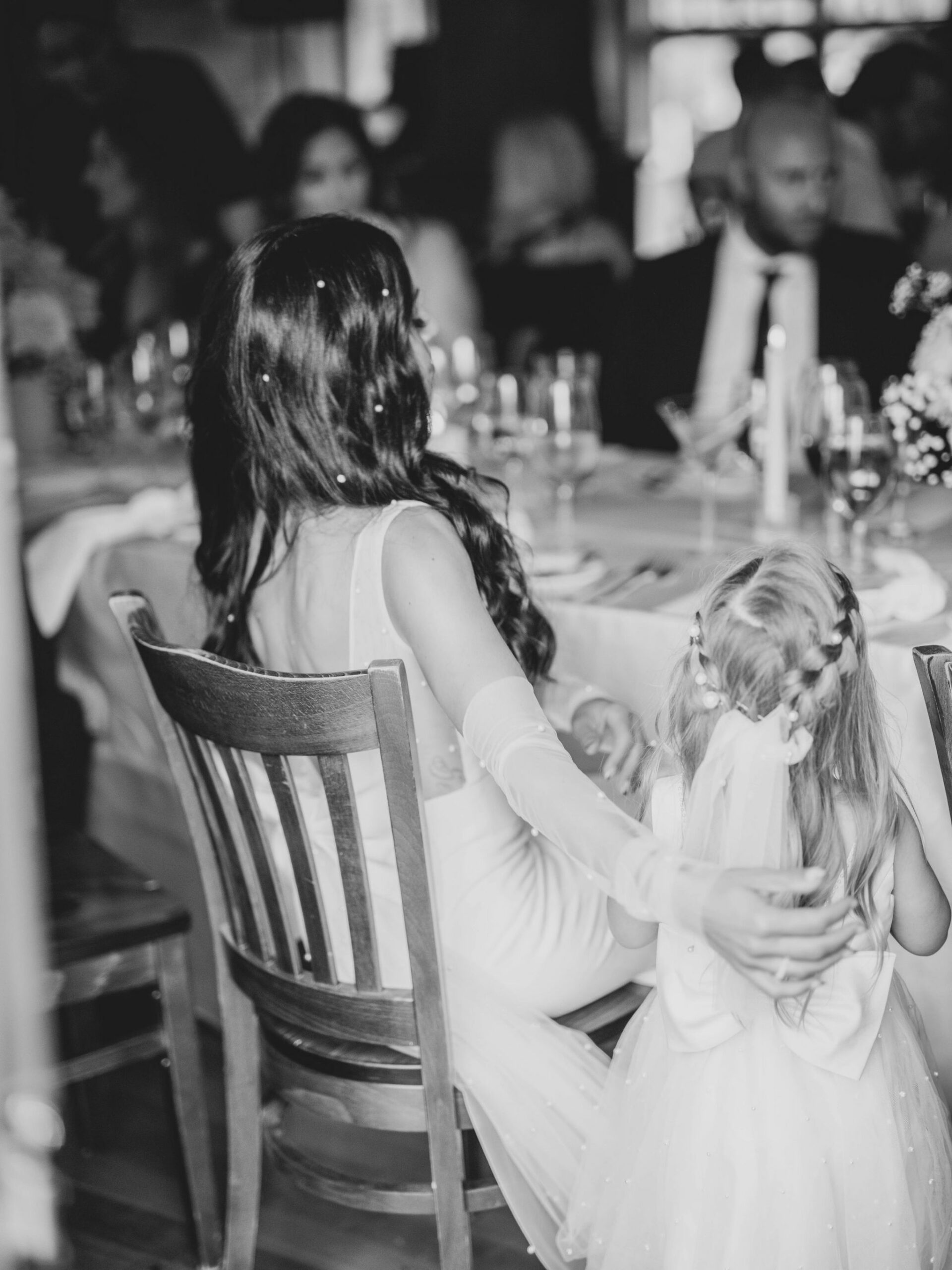 How to create a wedding guest list, bride with daughter wedding, flower girl and bride, black and white wedding reception