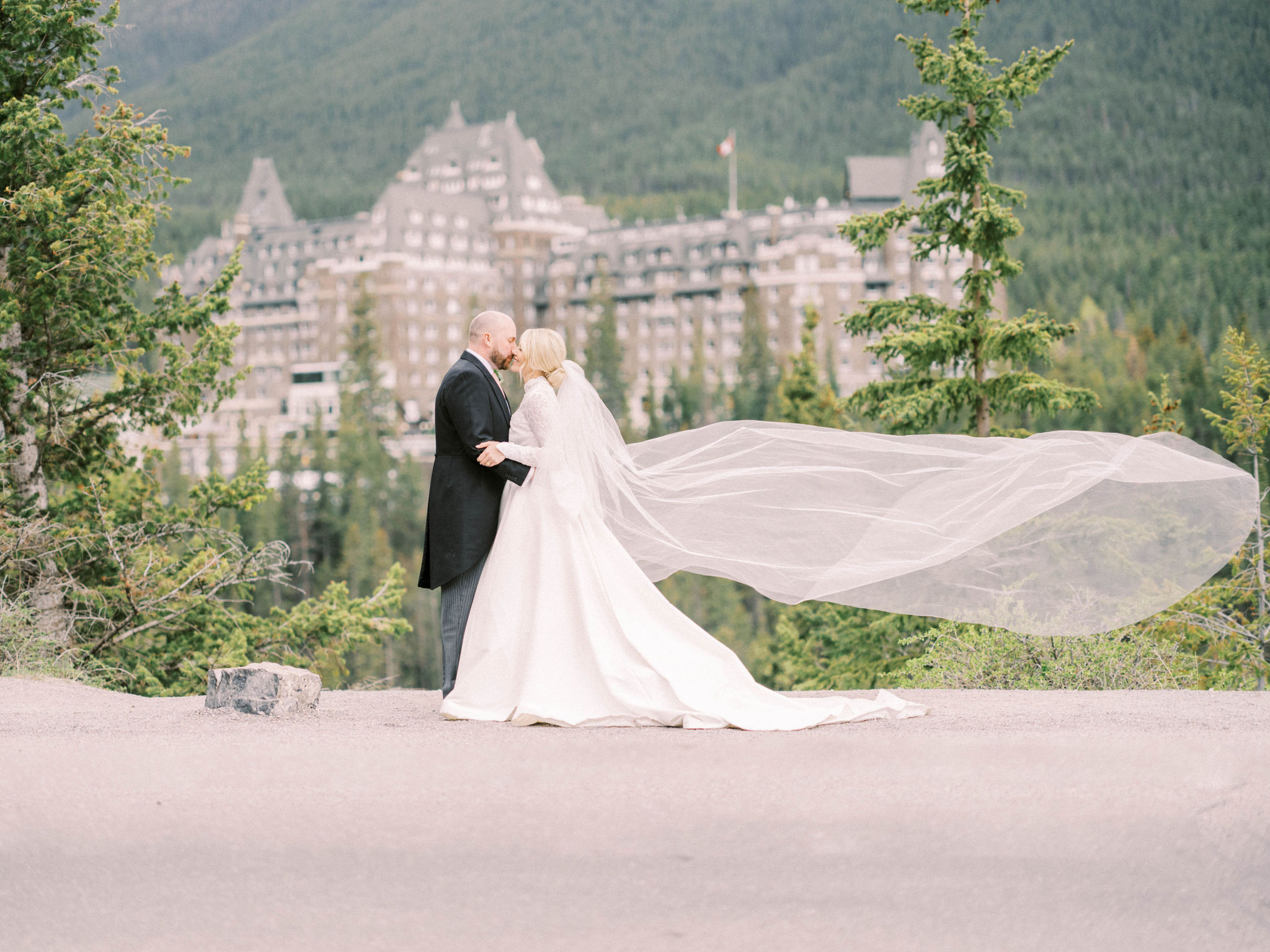how to choose an editorial wedding photographer in calgary, editorial engagement, editorial wedding photos, editorial style wedding, floral ceremony arch, baby breath ceremony, fairmont castle wedding photo, fairmont wedding, nicole sarah