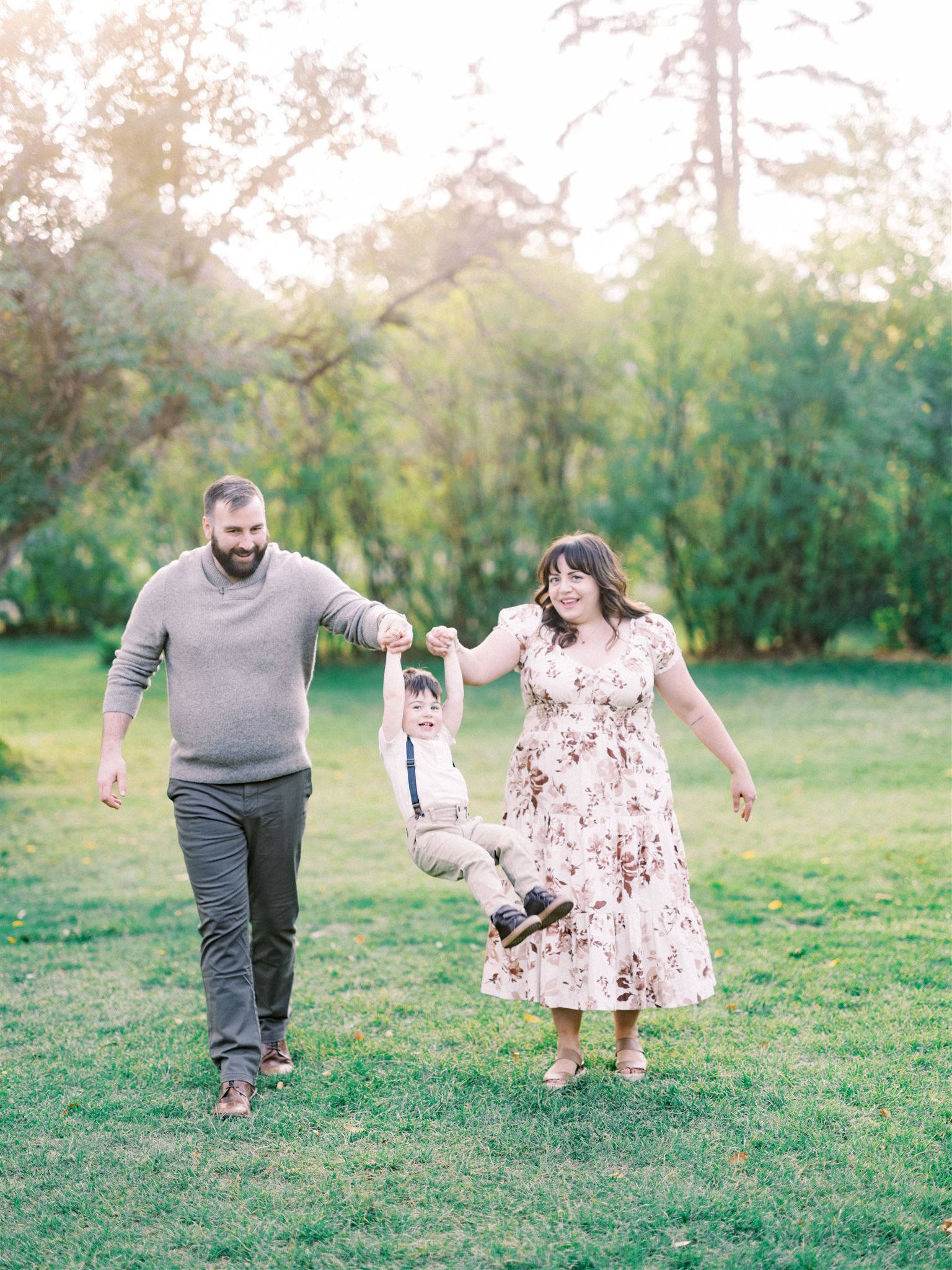 Bow Valley Fall Family Photographer Nicole Sarah, family photos calgary, fall family photo outfits, family photo inspiration, fall wardrobe photos, family smiling fall photos, affordable family photos, fall minis, mom and dad holding toddler, family photo poses