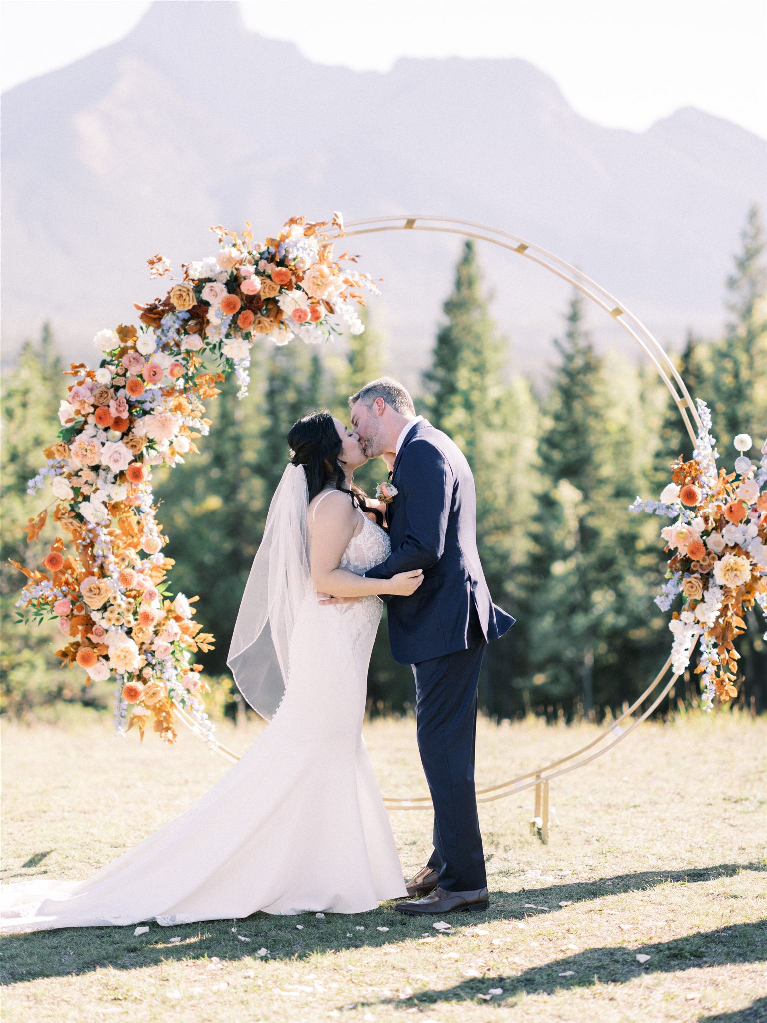 calgary wedding photographers, wedding ceremony, ceremony wedding arch, floral circle arch