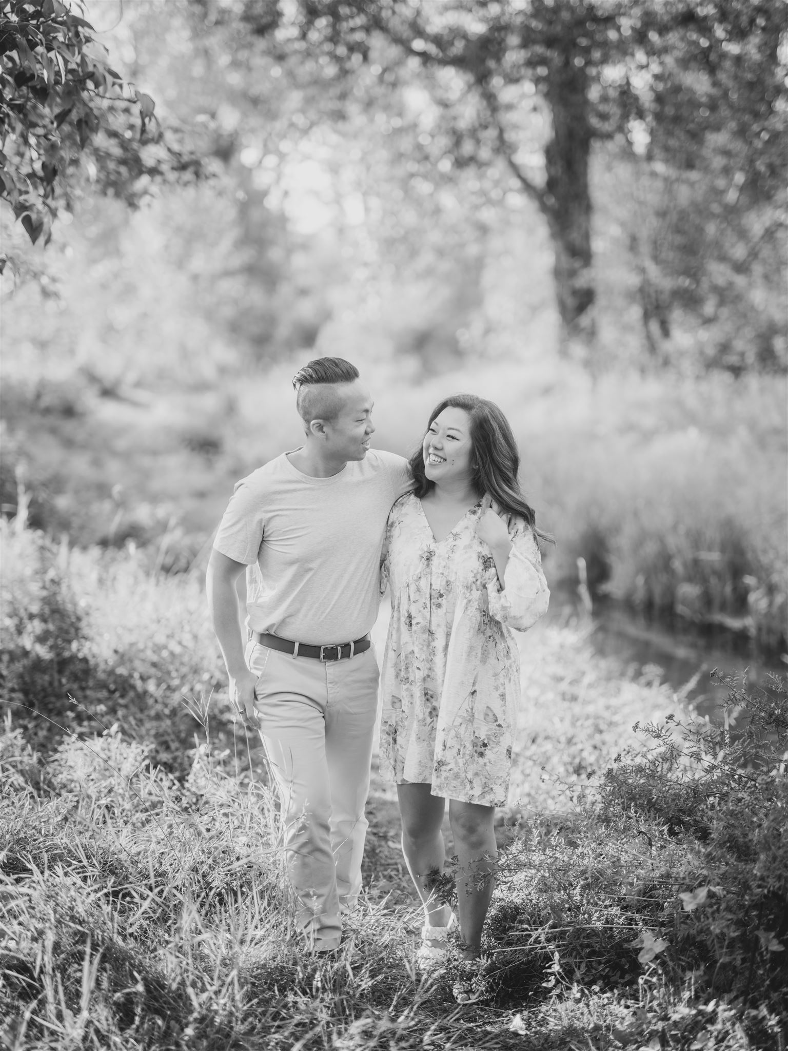 fun engagement poses, spring engagement, floral engagement dress, flower engagement dress, sunset engagement, editorial engagement photos, film engagement, film photography, best wedding photographers canada, flirty engagement poses