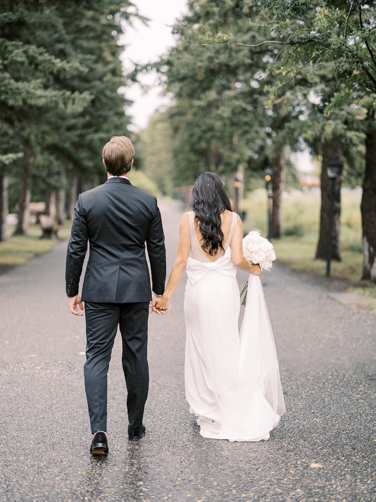bow valley, italian wedding, couple walking away from camera