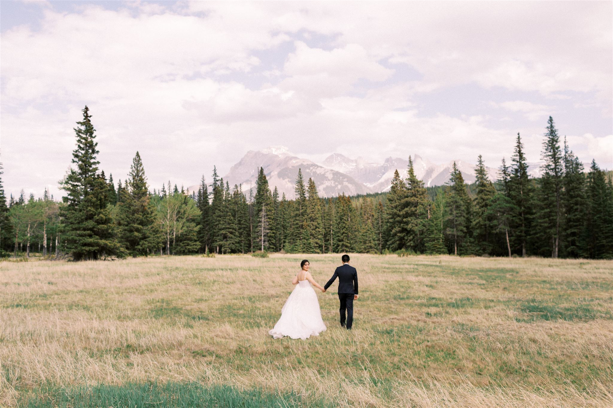Banff Wedding Photographer, lake minnewanka elopement, banff elopement, mountain backdrop, mountain wedding photos, nicole sarah, banff national park, banff national park wedding
