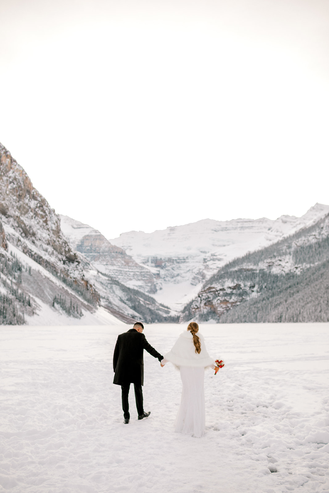 Banff Wedding Photographer, lake minnewanka elopement, banff elopement, mountain backdrop, mountain wedding photos, nicole sarah, banff national park, banff national park wedding, lake louise winter wedding