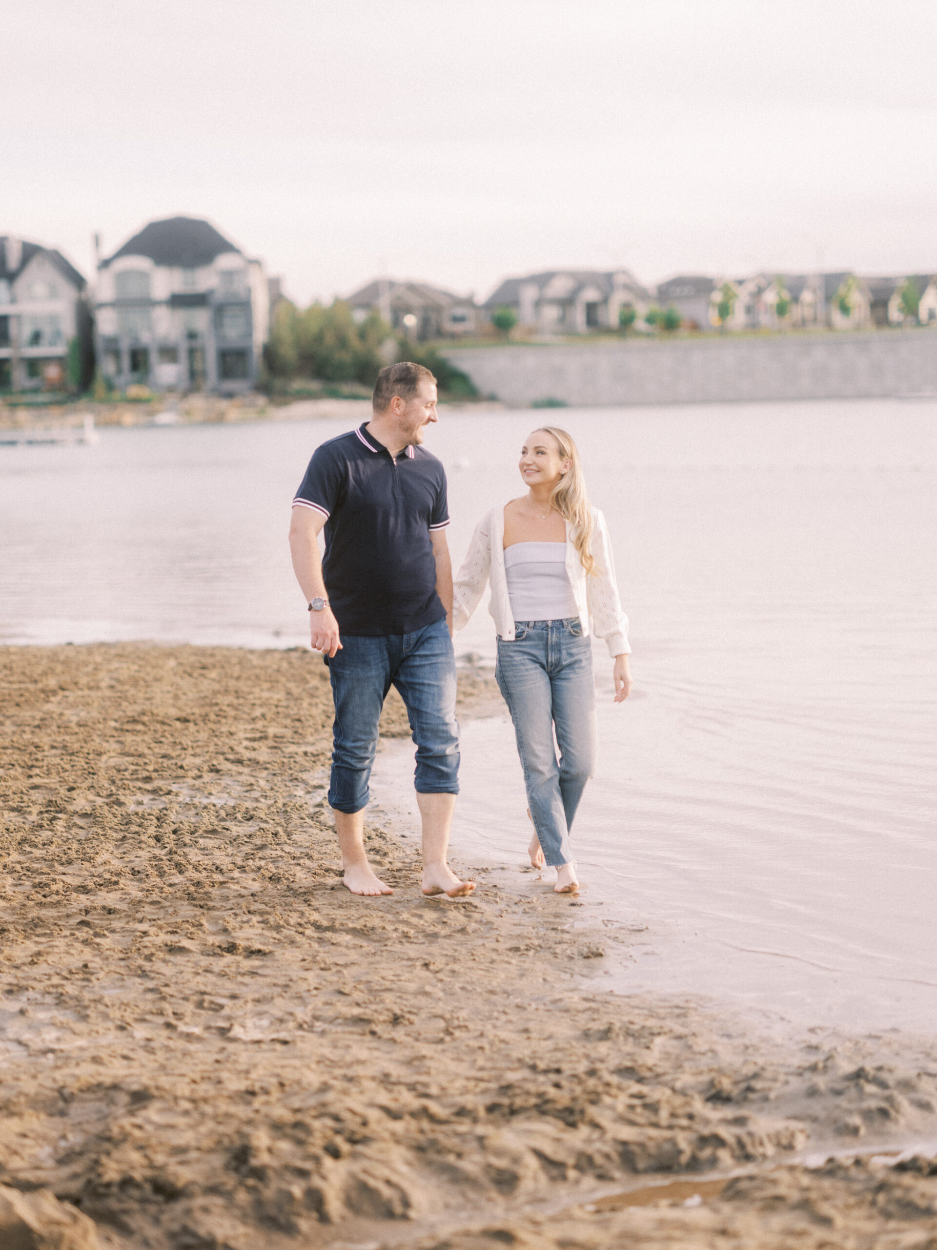 Summer beach engagement, couple walking down the beach, running on beach bride, running beach engagement, bride on the beach, romantic beach photos, romantic beach photography, nicole sarah photography, mahogany beach club, mahogany family photographer, couple cuddling on the beach, engagement wardrobe beach inspiration