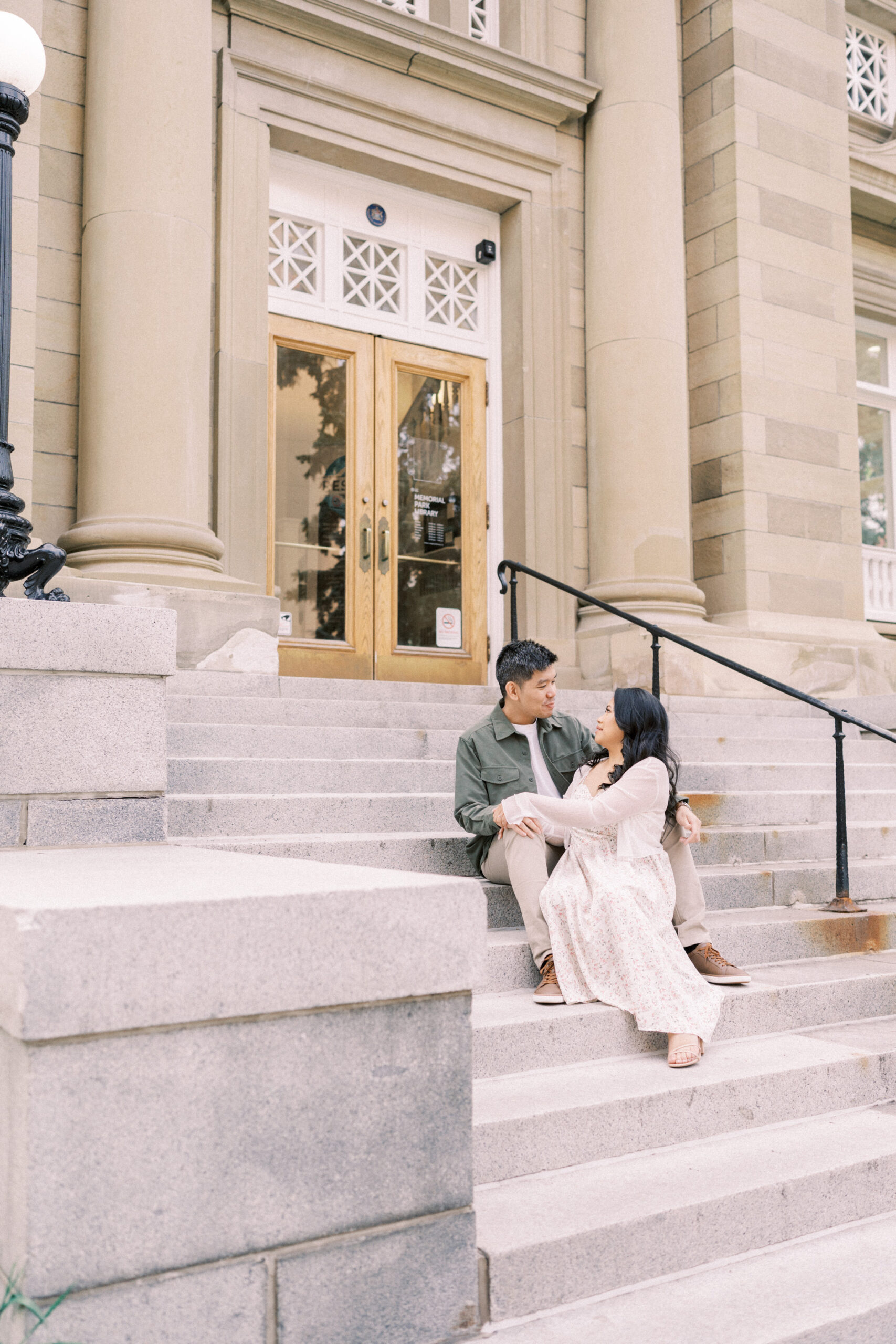 Urban Calgary Engagement Session, Central memorial library, sunset urban engagement, nicole sarah engagemet, affordable wedding photographers, award winning wedding photographers, film wedding photographers, couple laughing and dancing in park, engagement inspiration, nicole sarah, engagement session, engagement wardrobe, arizona wedding photographer, alberta wedding photographers