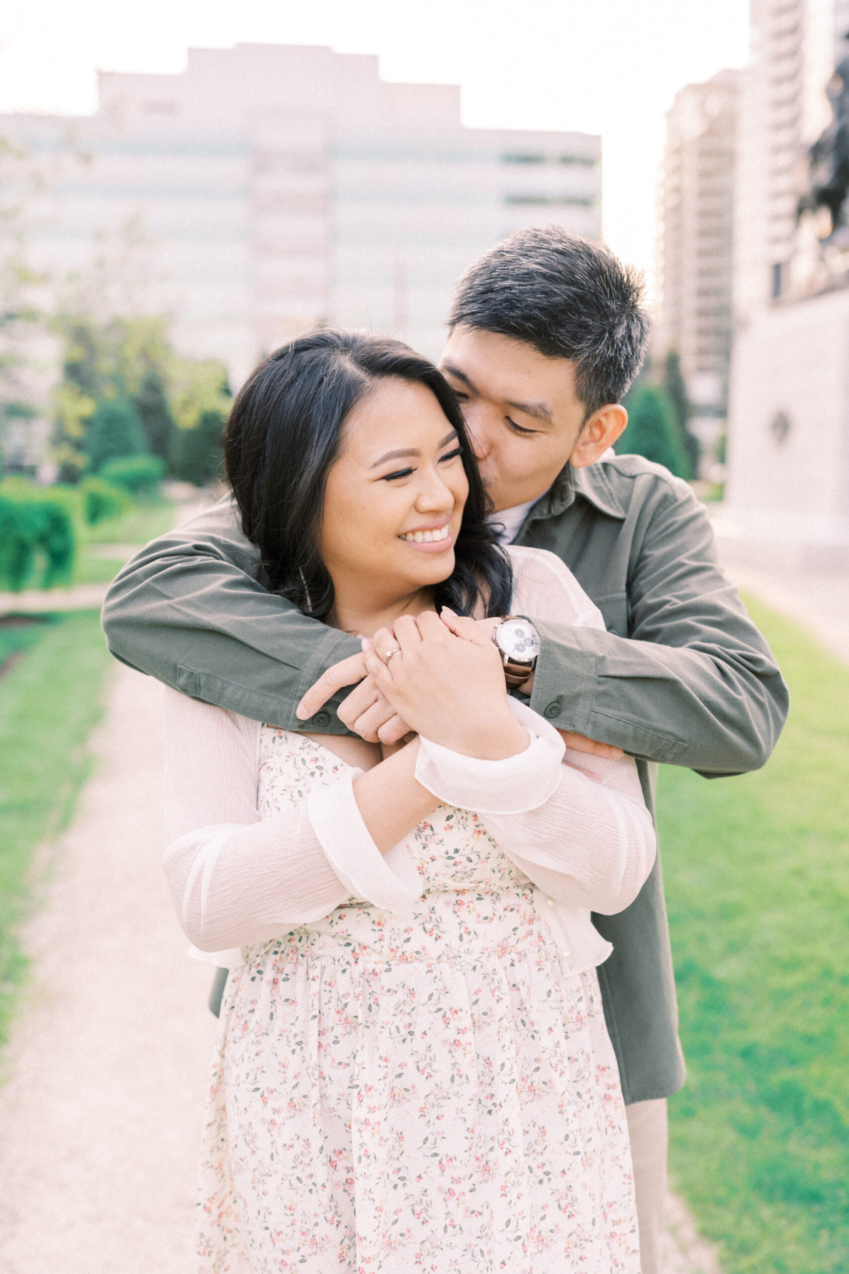 Urban Calgary Engagement Session, Central memorial library, sunset urban engagement, nicole sarah engagemet, affordable wedding photographers, award winning wedding photographers, film wedding photographers, couple laughing and dancing in park, engagement inspiration, nicole sarah, engagement session, engagement wardrobe, arizona wedding photographer, alberta wedding photographers