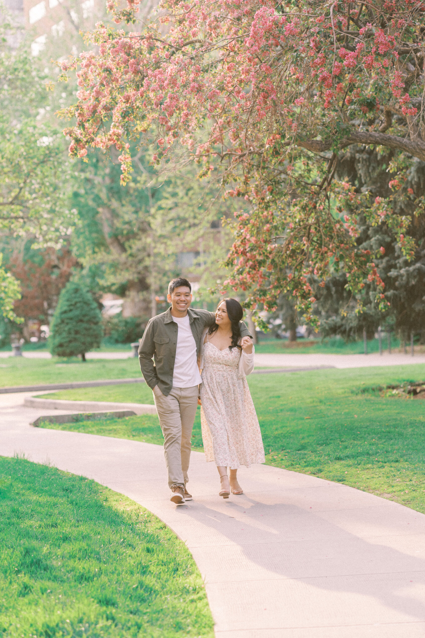 Urban Calgary Engagement Session, Central memorial library, sunset urban engagement, nicole sarah engagemet, affordable wedding photographers, award winning wedding photographers, film wedding photographers, couple laughing and dancing in park, engagement inspiration, nicole sarah, engagement session, engagement wardrobe, arizona wedding photographer, alberta wedding photographers