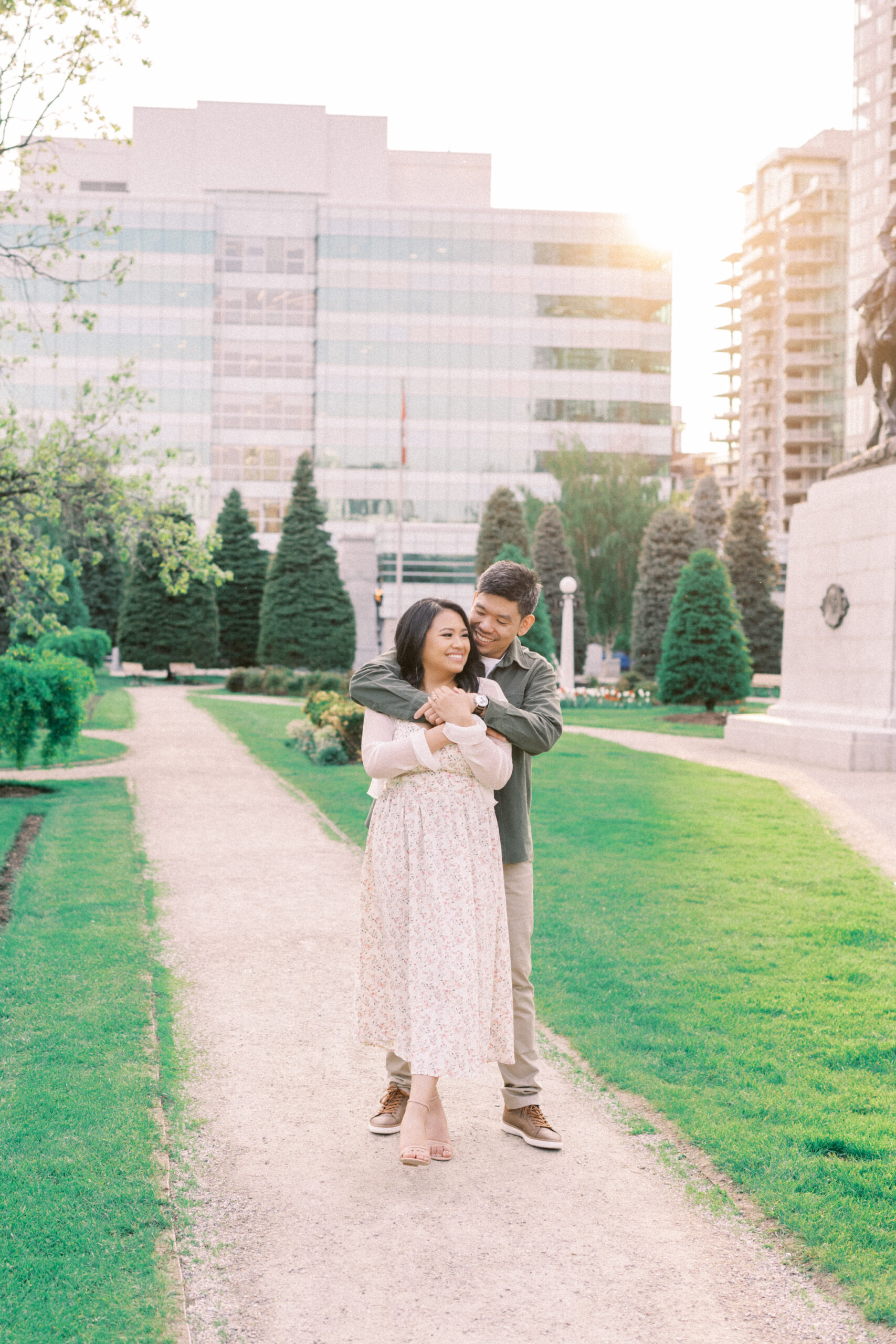 Urban Calgary Engagement Session, Central memorial library, sunset urban engagement, nicole sarah engagemet, affordable wedding photographers, award winning wedding photographers, film wedding photographers, couple laughing and dancing in park, engagement inspiration, nicole sarah, engagement session, engagement wardrobe, arizona wedding photographer, alberta wedding photographers