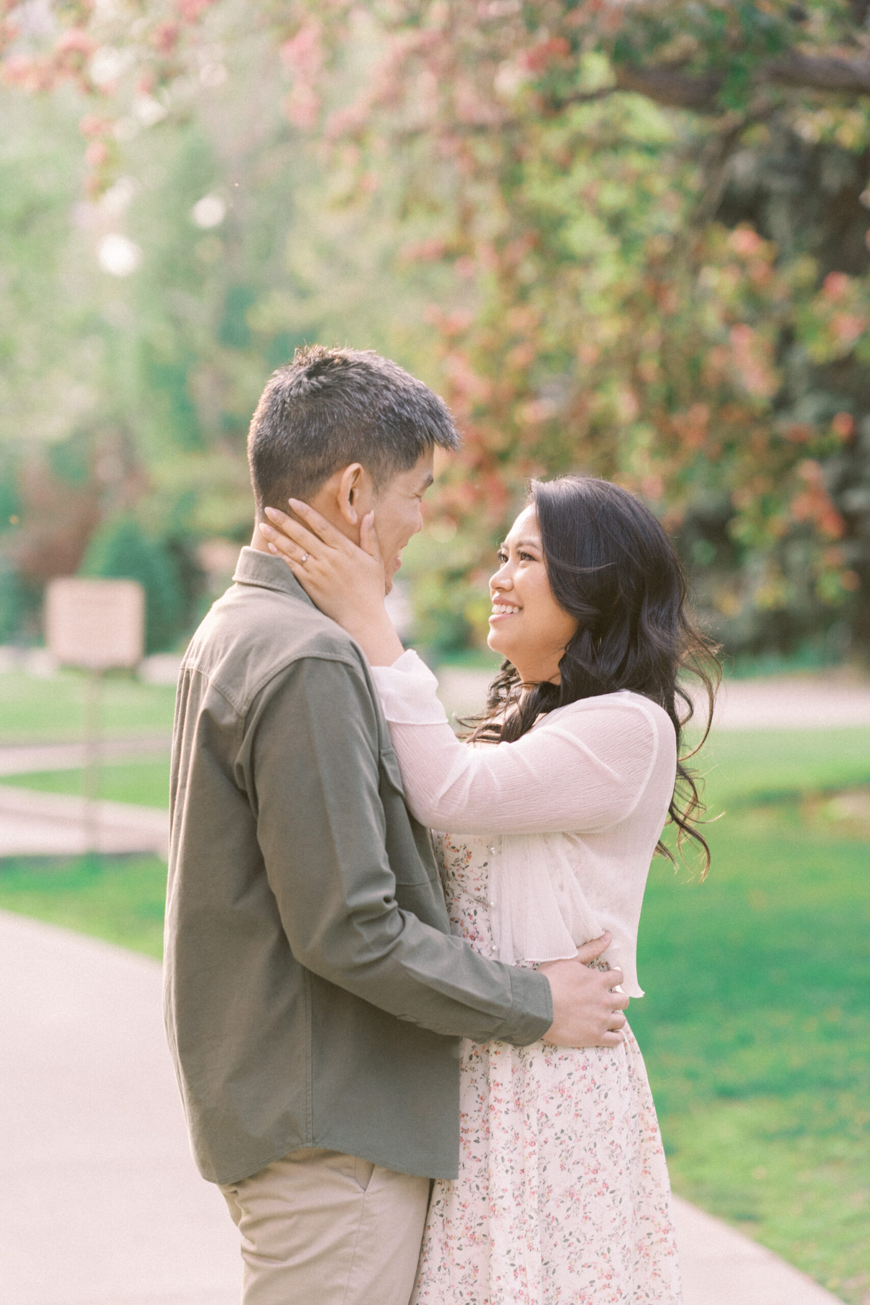 Urban Calgary Engagement Session, Central memorial library, sunset urban engagement, nicole sarah engagemet, affordable wedding photographers, award winning wedding photographers, film wedding photographers, couple laughing and dancing in park, engagement inspiration, nicole sarah, engagement session, engagement wardrobe, arizona wedding photographer, alberta wedding photographers