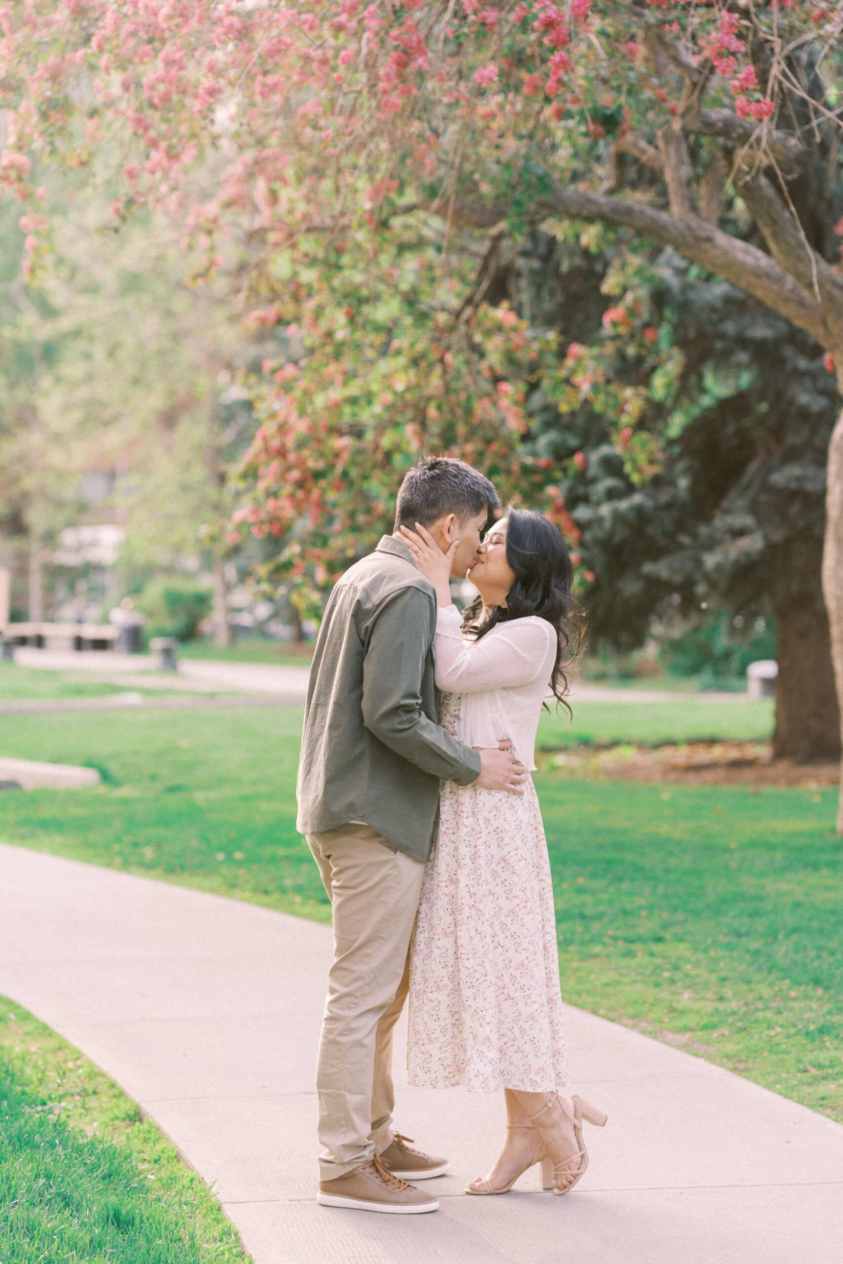 Urban Calgary Engagement Session, Central memorial library, sunset urban engagement, nicole sarah engagemet, affordable wedding photographers, award winning wedding photographers, film wedding photographers, couple laughing and dancing in park, engagement inspiration, nicole sarah, engagement session, engagement wardrobe, arizona wedding photographer, alberta wedding photographers