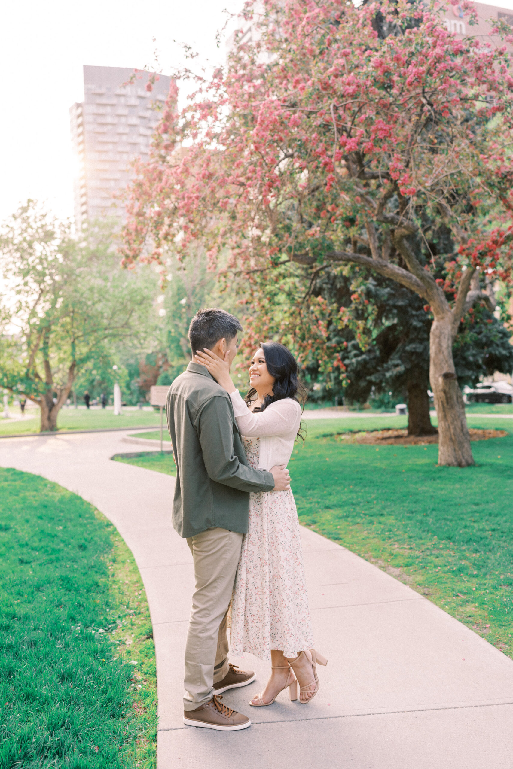 Urban Calgary Engagement Session, Central memorial library, sunset urban engagement, nicole sarah engagemet, affordable wedding photographers, award winning wedding photographers, film wedding photographers, couple laughing and dancing in park, engagement inspiration, nicole sarah, engagement session, engagement wardrobe, arizona wedding photographer, alberta wedding photographers