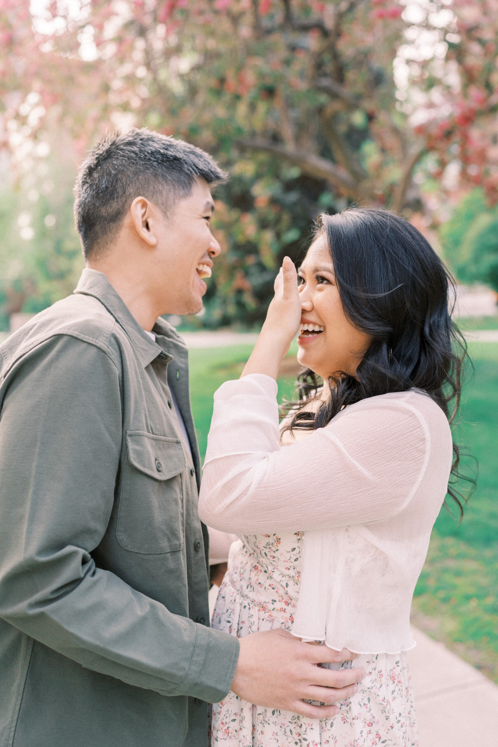 Urban Calgary Engagement Session, Central memorial library, sunset urban engagement, nicole sarah engagemet, affordable wedding photographers, award winning wedding photographers, film wedding photographers, couple laughing and dancing in park, engagement inspiration, nicole sarah, engagement session, engagement wardrobe, arizona wedding photographer, alberta wedding photographers