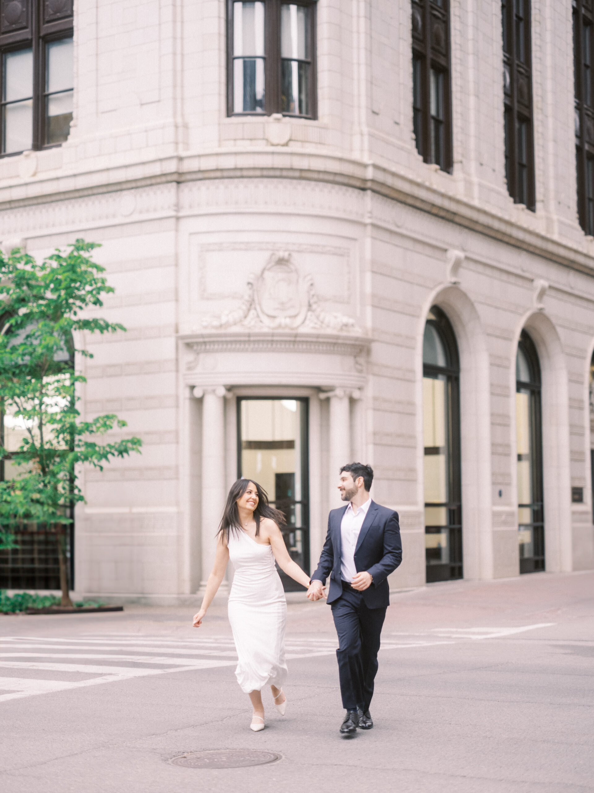 Modern Stephen's Avenue Engagement, new york engagement, nicole sarah, modern engagement session, white dress engagement, hailing a cab engagement, couple running downtown engagement, downtown engagement session, urban new york vibe, teatro engagement session, calgary wedding photographer, nicole sarah, best wedding photographers calgary, affordable wedding photography