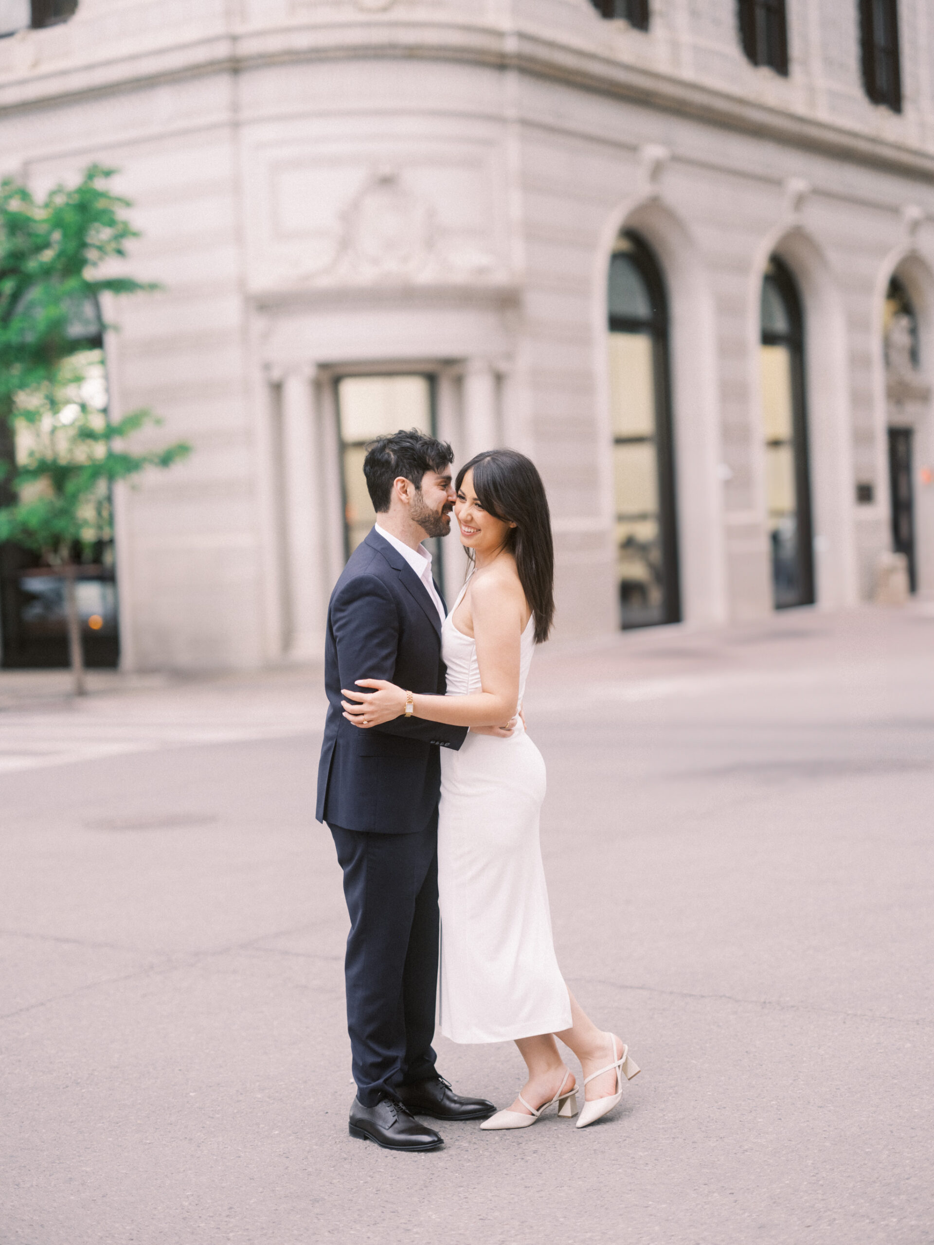 Modern Stephen's Avenue Engagement, new york engagement, nicole sarah, modern engagement session, white dress engagement, hailing a cab engagement, couple running downtown engagement, downtown engagement session, urban new york vibe, teatro engagement session, calgary wedding photographer, nicole sarah, best wedding photographers calgary, affordable wedding photography