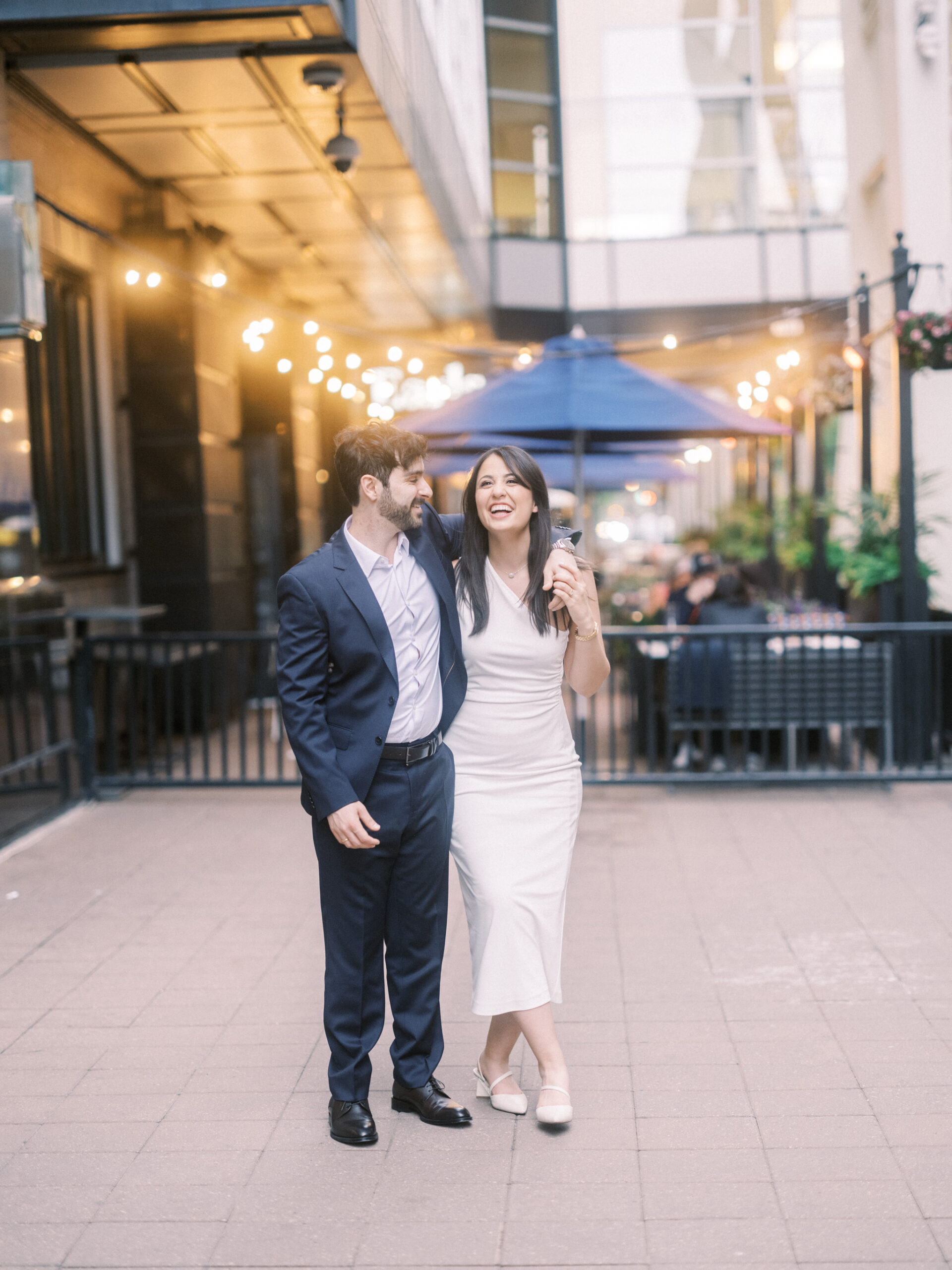 Modern Stephen's Avenue Engagement, new york engagement, nicole sarah, modern engagement session, white dress engagement, hailing a cab engagement, couple running downtown engagement, downtown engagement session, urban new york vibe, teatro engagement session, calgary wedding photographer, nicole sarah, best wedding photographers calgary, affordable wedding photography