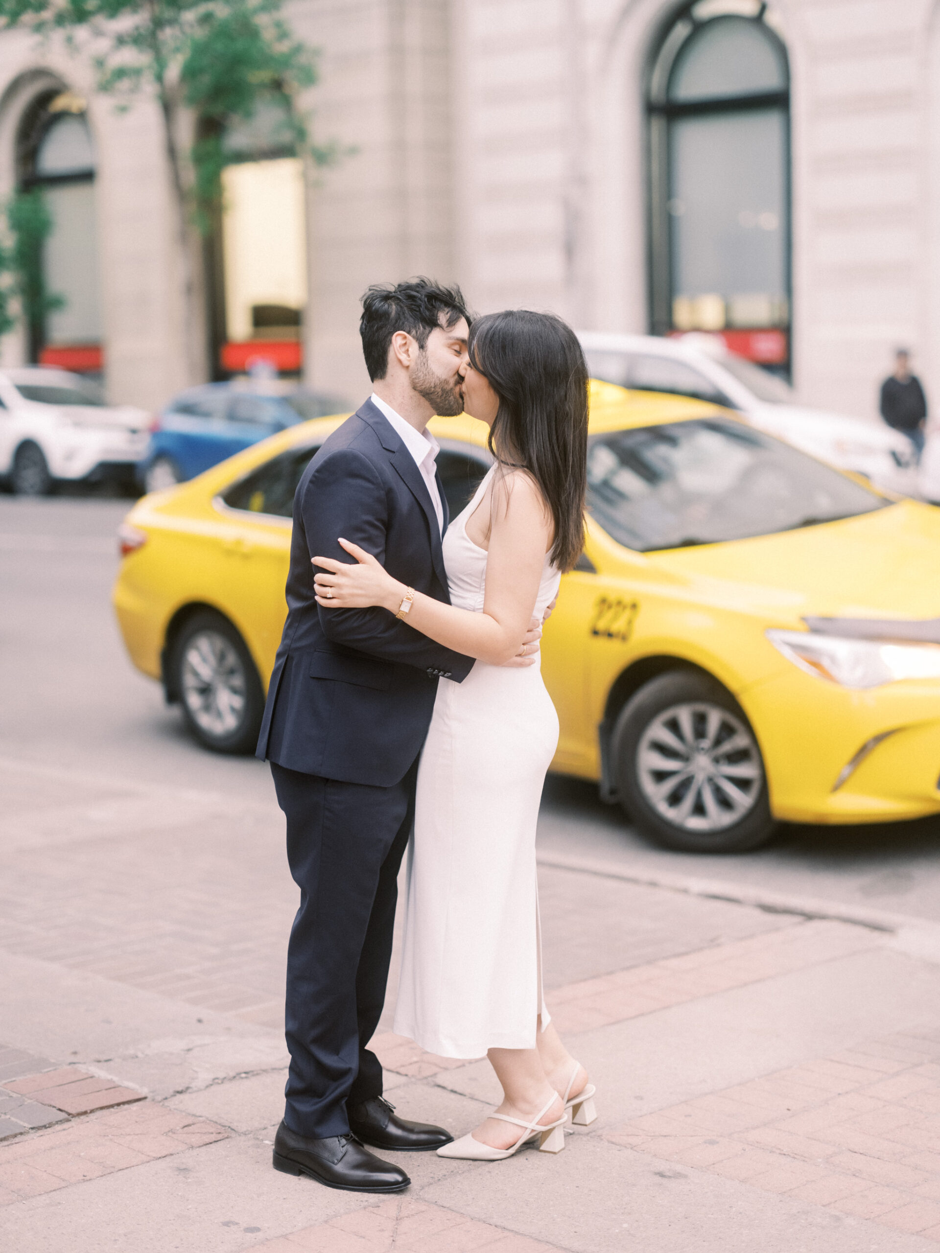 Modern Stephen's Avenue Engagement, new york engagement, nicole sarah, modern engagement session, white dress engagement, hailing a cab engagement, couple running downtown engagement, downtown engagement session, urban new york vibe, teatro engagement session, calgary wedding photographer, nicole sarah, best wedding photographers calgary, affordable wedding photography