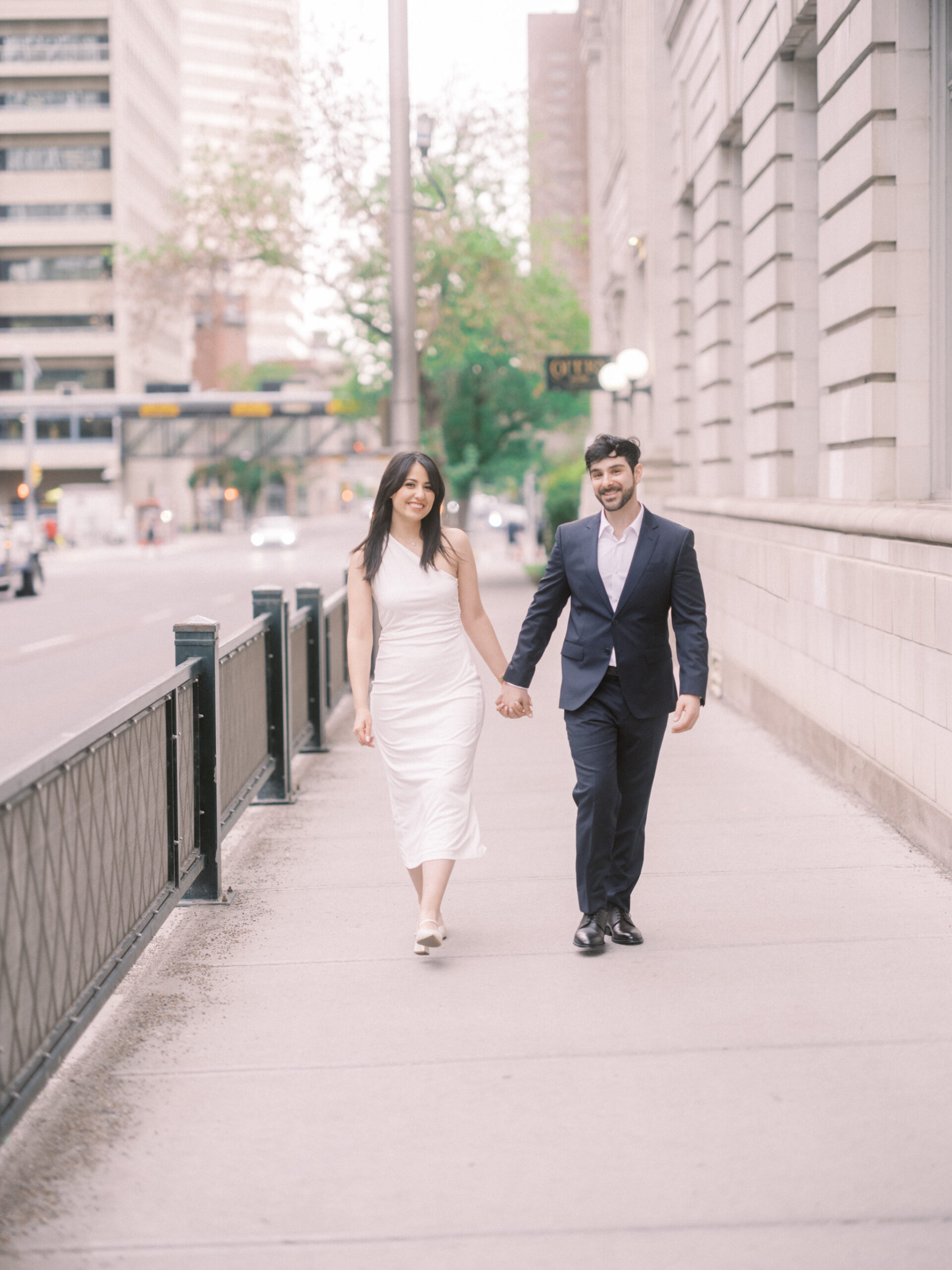 Modern Stephen's Avenue Engagement, new york engagement, nicole sarah, modern engagement session, white dress engagement, hailing a cab engagement, couple running downtown engagement, downtown engagement session, urban new york vibe, teatro engagement session, calgary wedding photographer, nicole sarah, best wedding photographers calgary, affordable wedding photography