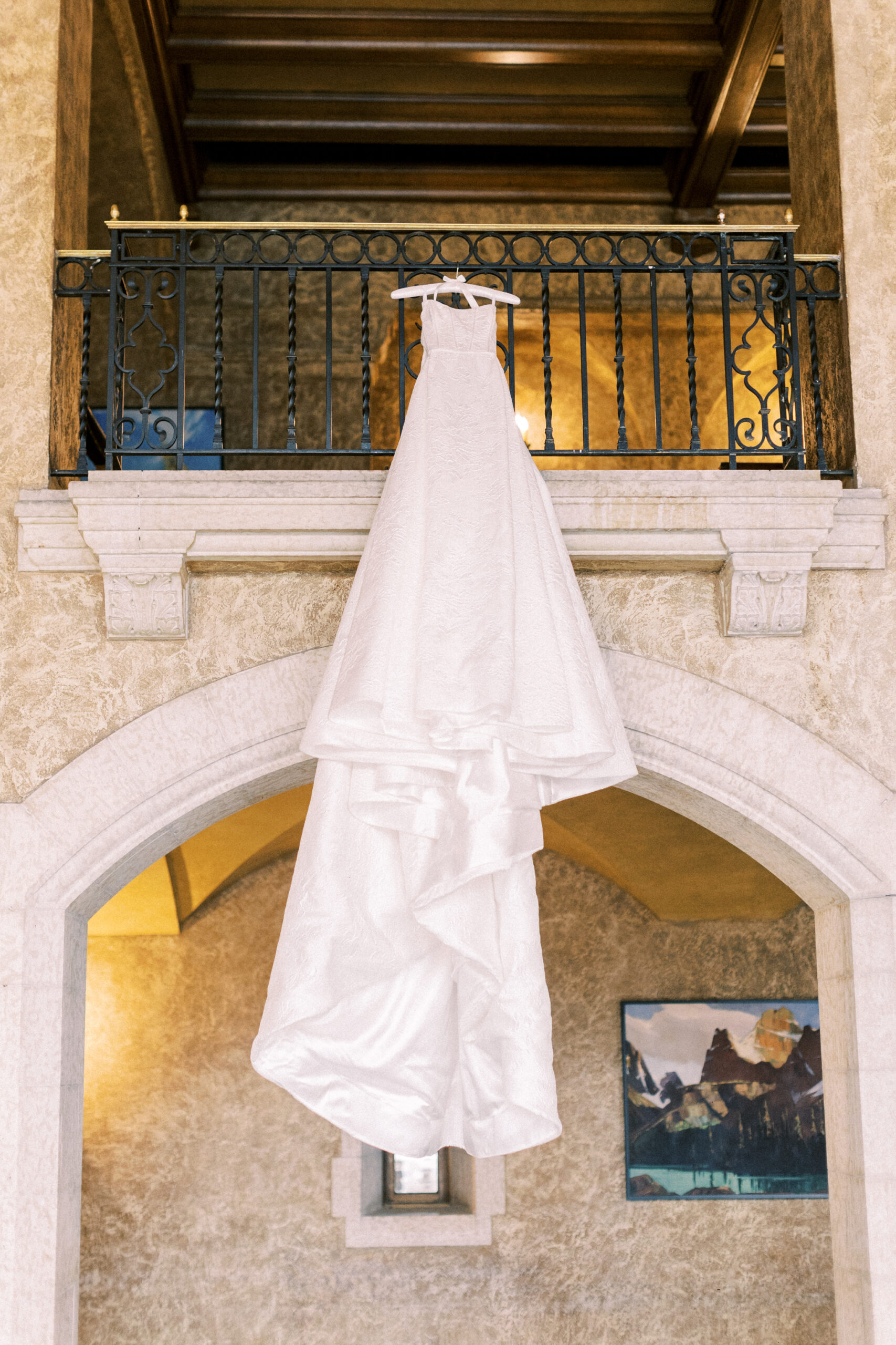 wedding dress hanging, wedding dress shot, fairmont banff springs wedding, luxury wedding, destination wedding photographer nicole sarah, ralph lauren polo bar wedding, winter wedding, mountain wedding, rocky mountain weddings