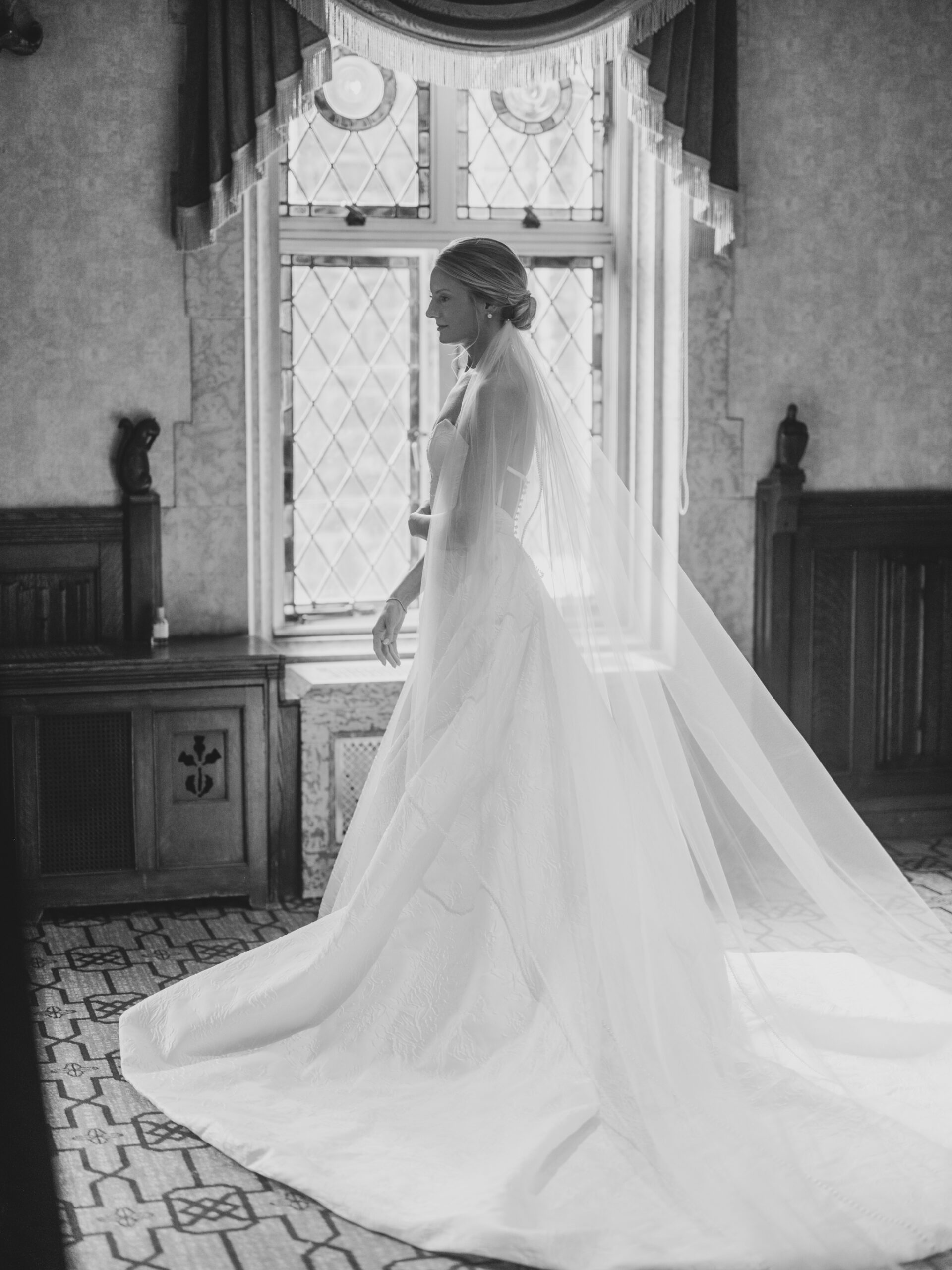 bride getting ready, black white, fairmont banff springs wedding, luxury wedding, destination wedding photographer nicole sarah, ralph lauren polo bar wedding, winter wedding, mountain wedding, rocky mountain weddings