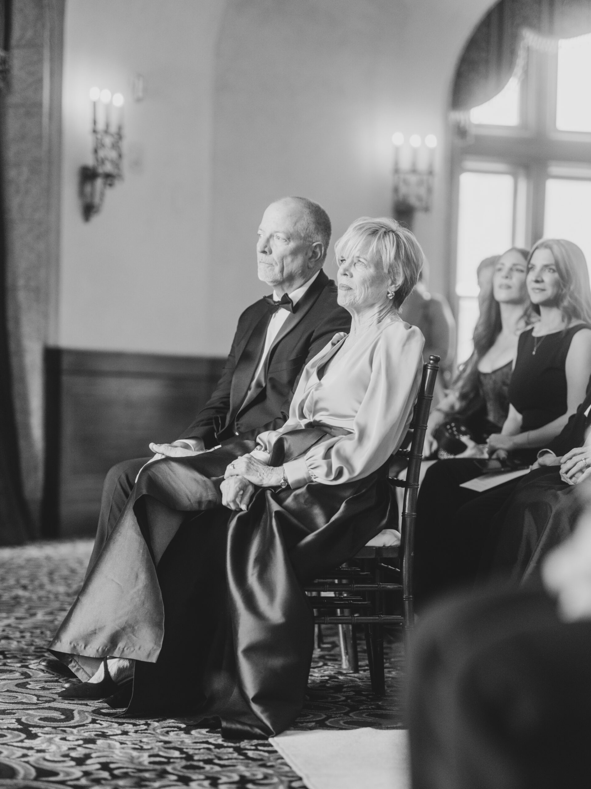 parents watching wedding ceremony, fairmont banff springs wedding, luxury wedding, destination wedding photographer nicole sarah, ralph lauren polo bar wedding, winter wedding, mountain wedding, rocky mountain weddings