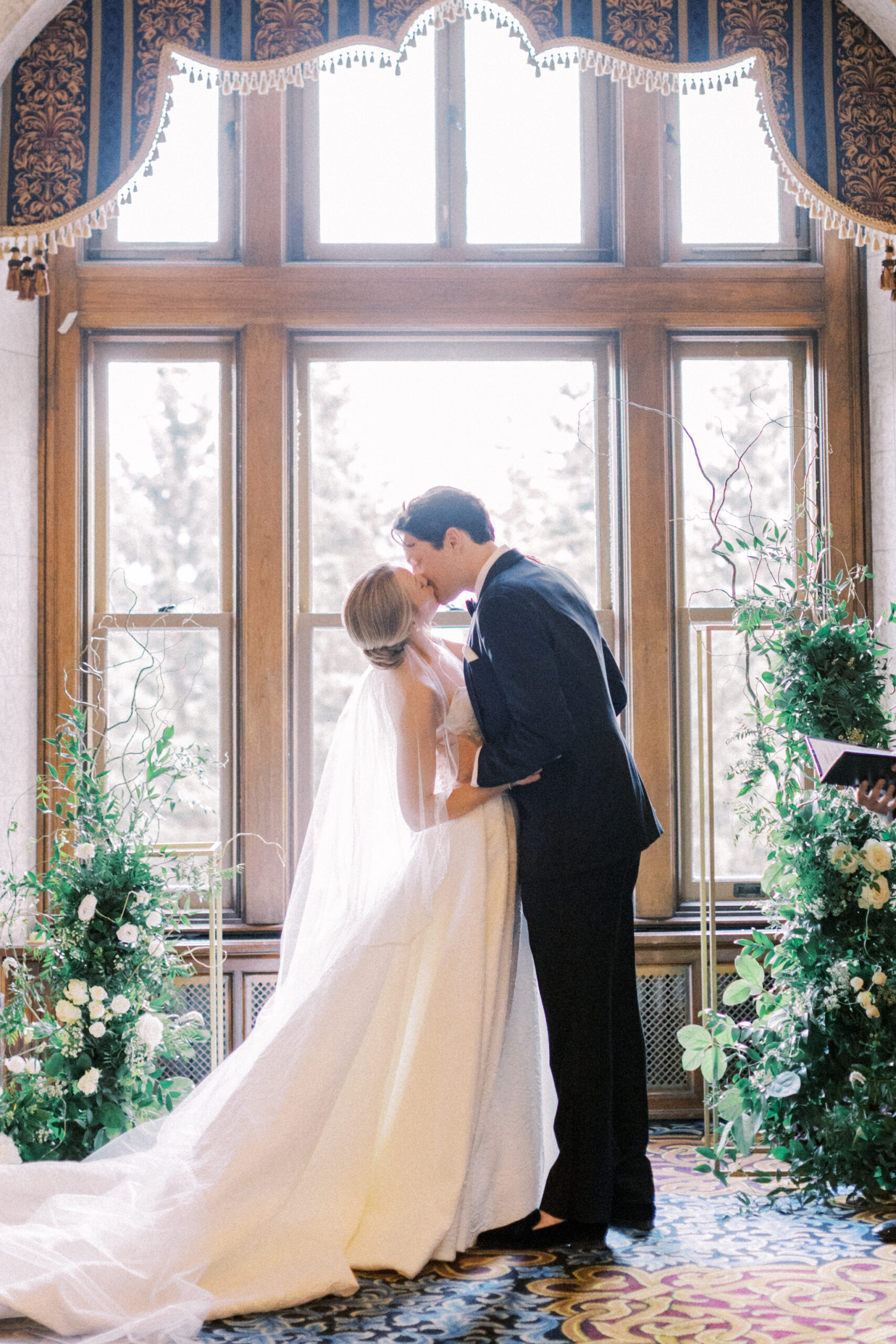 wedding ceremony kiss, fairmont banff springs wedding, luxury wedding, destination wedding photographer nicole sarah, ralph lauren polo bar wedding, winter wedding, mountain wedding, rocky mountain weddings