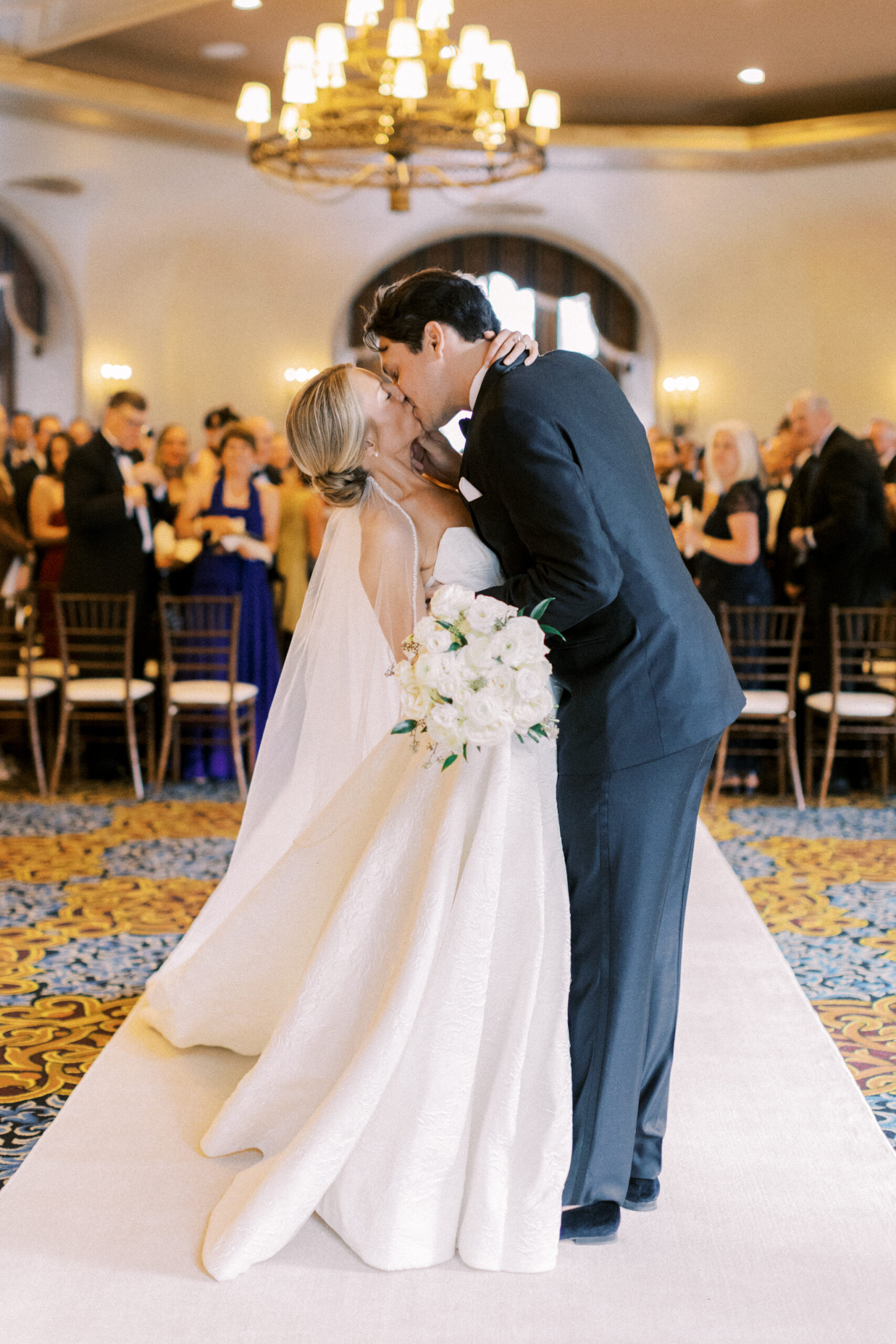 wedding ceremony kiss, fairmont banff springs wedding, luxury wedding, destination wedding photographer nicole sarah, ralph lauren polo bar wedding, winter wedding, mountain wedding, rocky mountain weddings