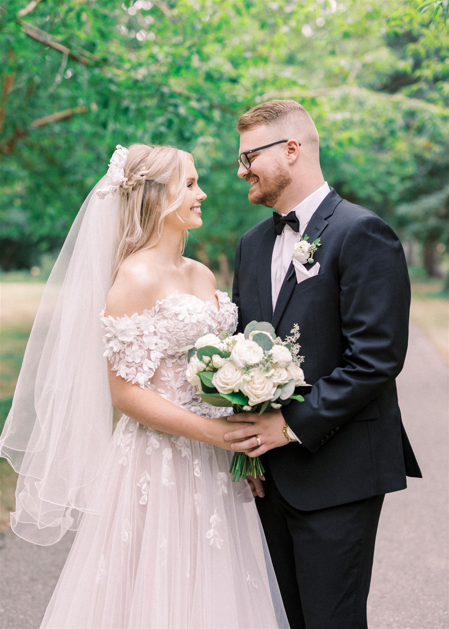 Waterfront Park Summer Calgary Wedding, lace wedding dress, nicole sarah, film wedding photography, film wedding photos, luxury wedding photographer calgary, romantic wedding portraits, alberta wedding photographers, lush greenery wedding photography, bride groom poses