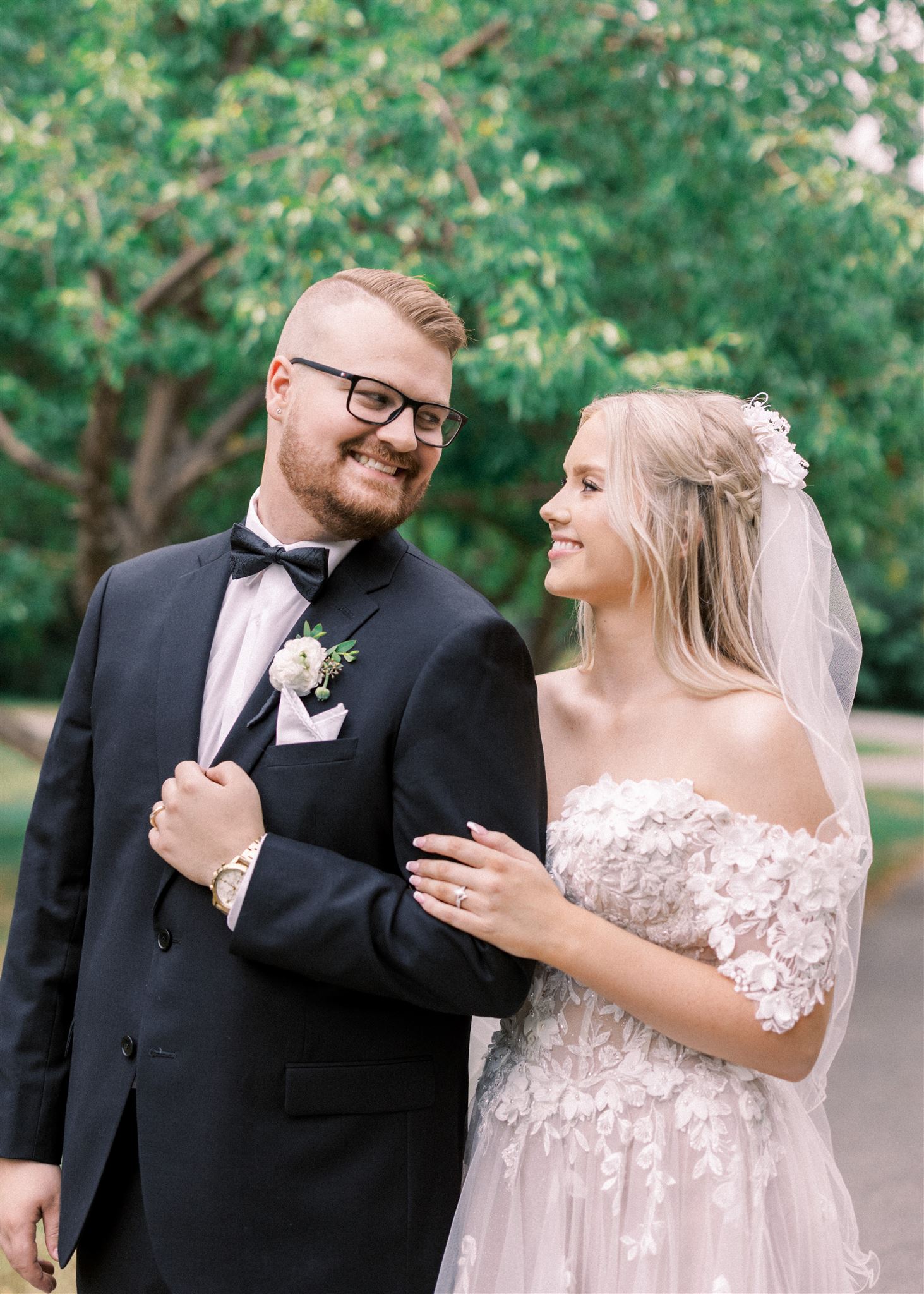 Waterfront Park Summer Calgary Wedding, lace wedding dress, nicole sarah, film wedding photography, film wedding photos, luxury wedding photographer calgary, romantic wedding portraits, alberta wedding photographers, lush greenery wedding photography, bride groom poses