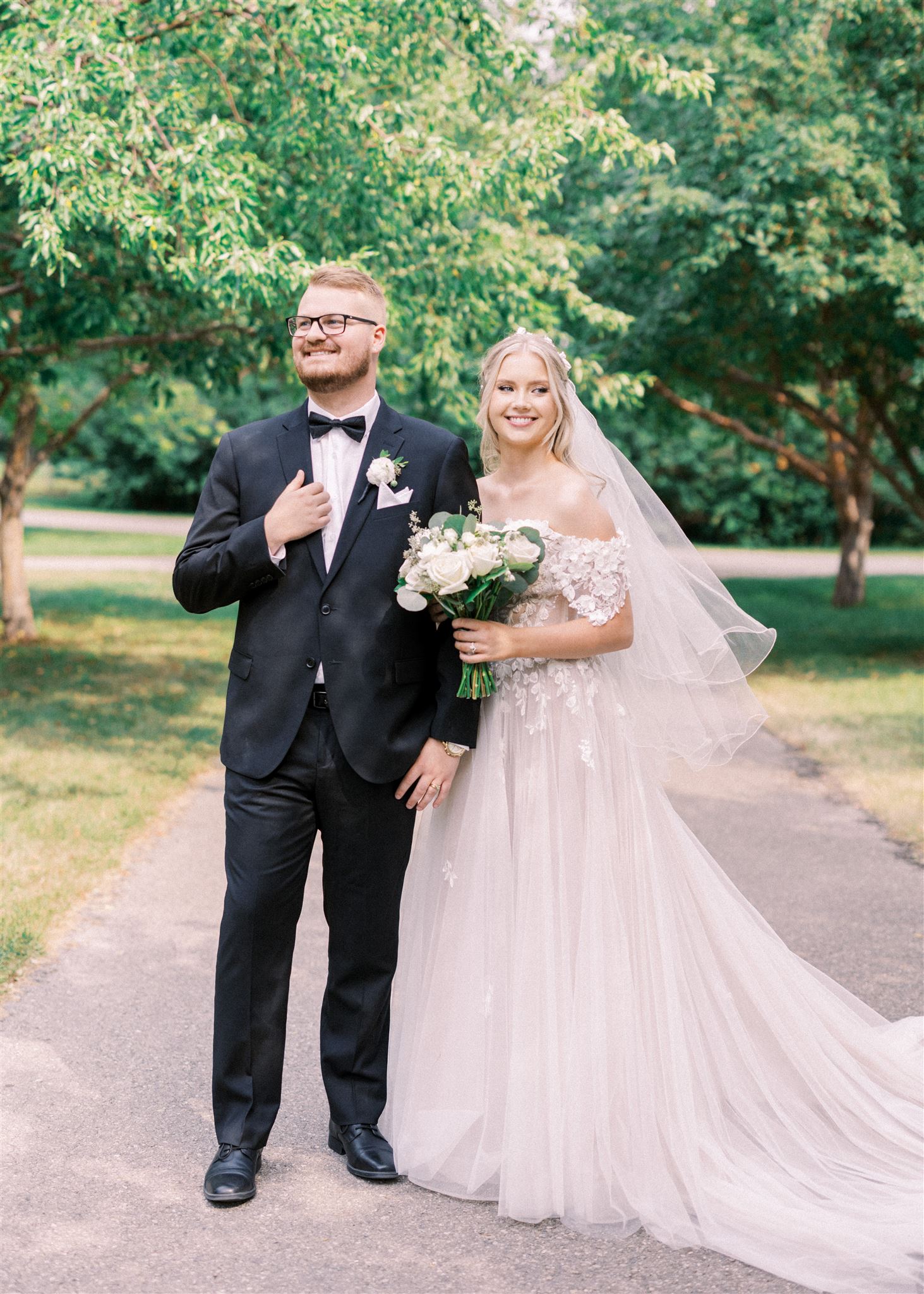 Waterfront Park Summer Calgary Wedding, lace wedding dress, nicole sarah, film wedding photography, film wedding photos, luxury wedding photographer calgary, romantic wedding portraits, alberta wedding photographers, lush greenery wedding photography, bride groom poses