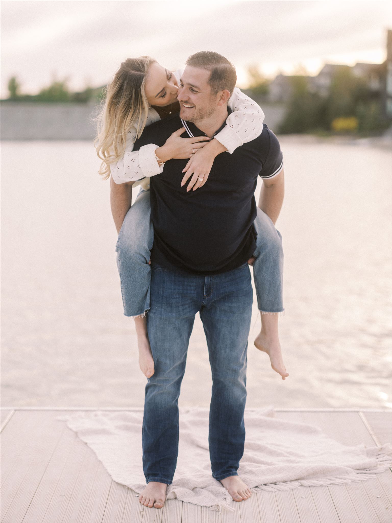 beach engagement, summer engagement, cute summer engagement, sunset engagement on the beach, nicole sarah, couple cuddling on the beach, summer beach engagement outfits, engagement poses beach, running on the beach engagement