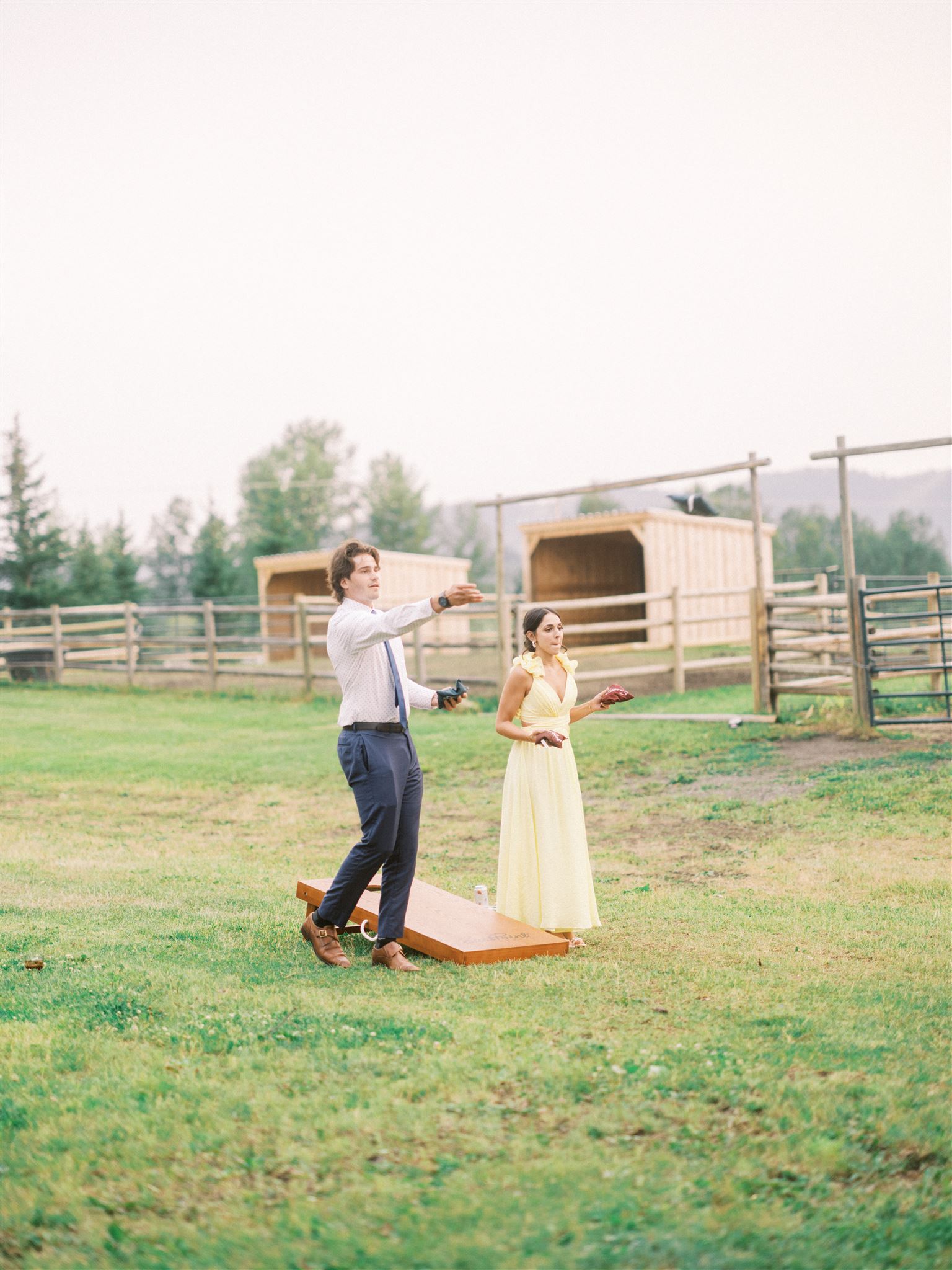 Calgary Tented Summer Wedding, estate wedding, sunset wedding film, sunset wedding photos, nicole sarah, timeless wedding photographers, timeless wedding photography, micro wedding ideas, wedding reception, weddings on film, film photographers, luxury wedding photographers calgary, vancouver wedding, wedding poses, couple cake cutting, tent weddings