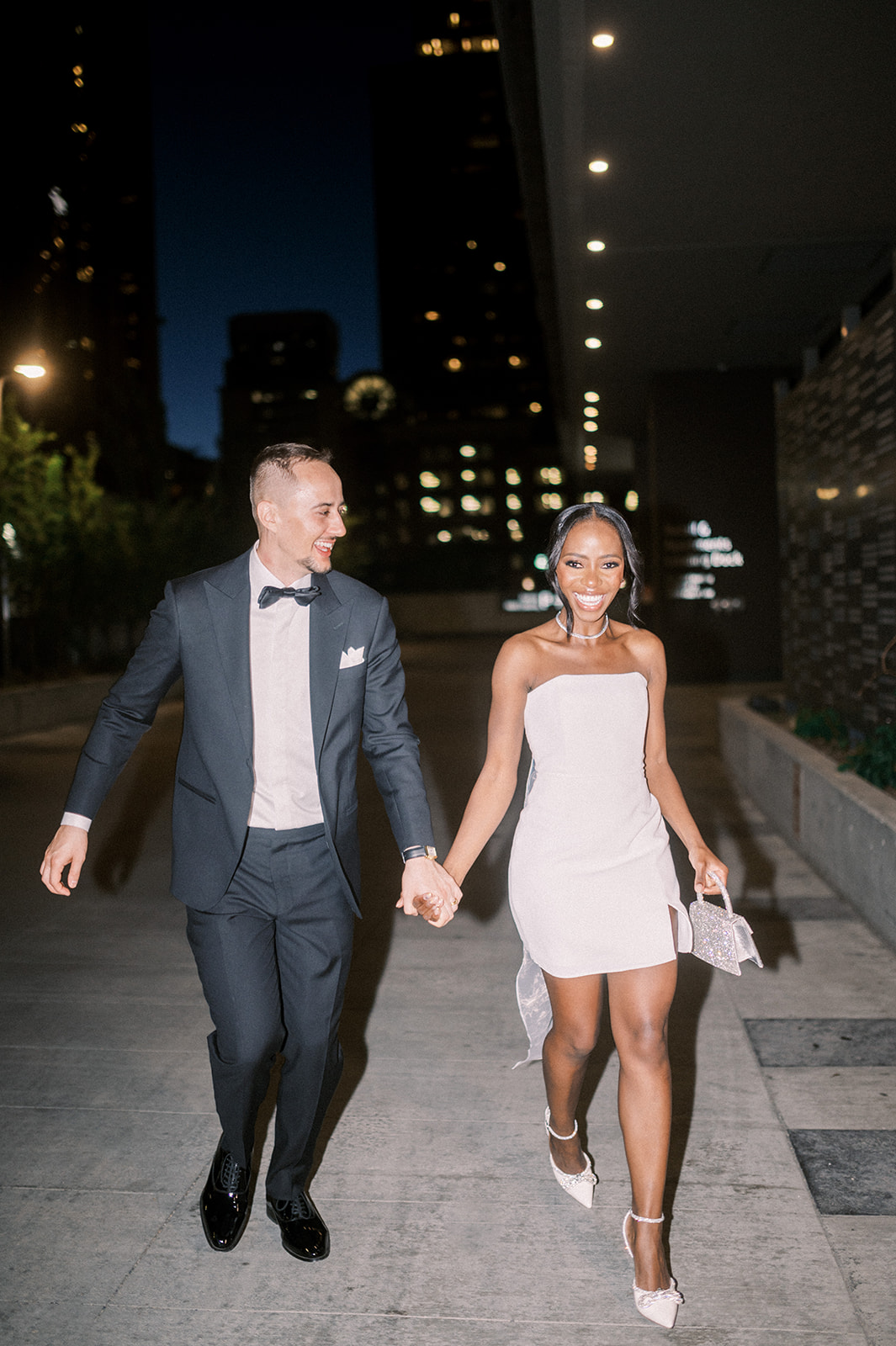 bride and groom at night walking, fun flash wedding photos, vibey wedding photo, flash wedding photos, documentary style photo wedding walking